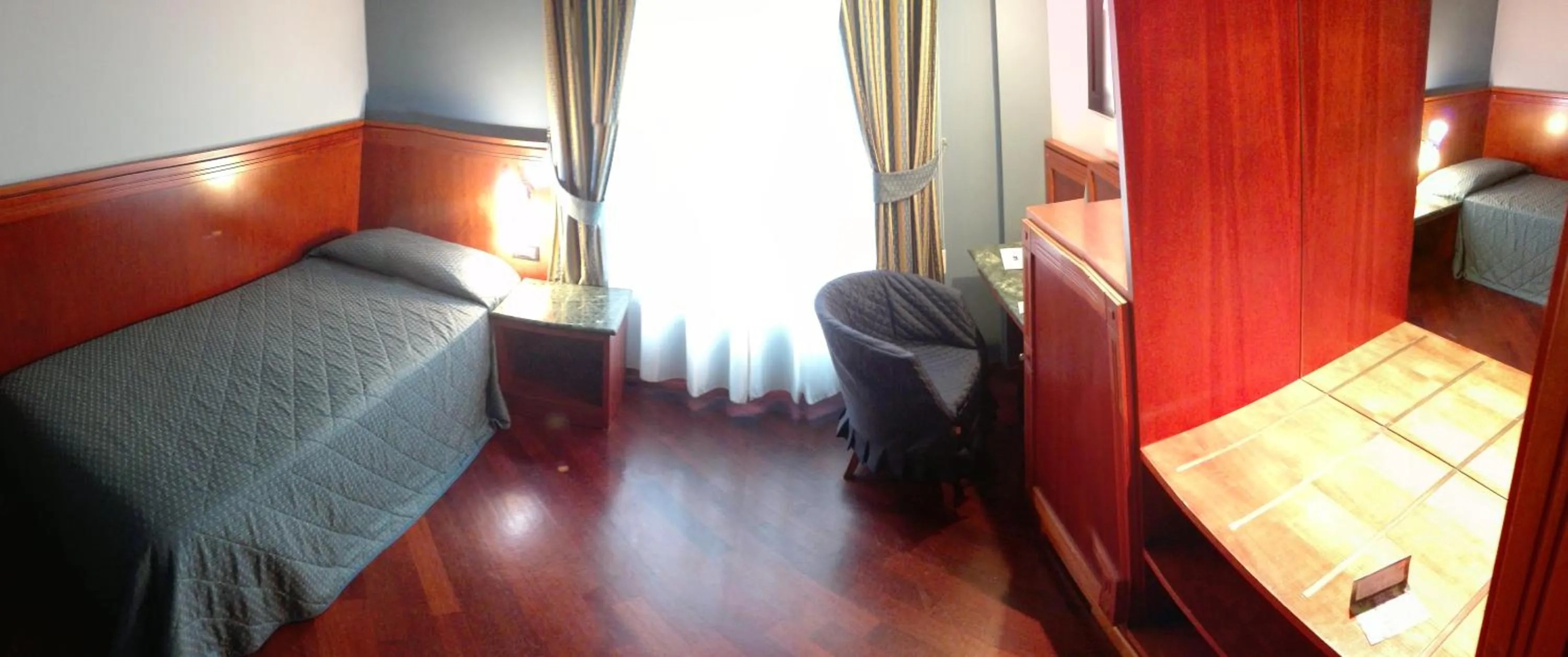 Photo of the whole room, Bed in Hotel Michelangelo Palace & SPA
