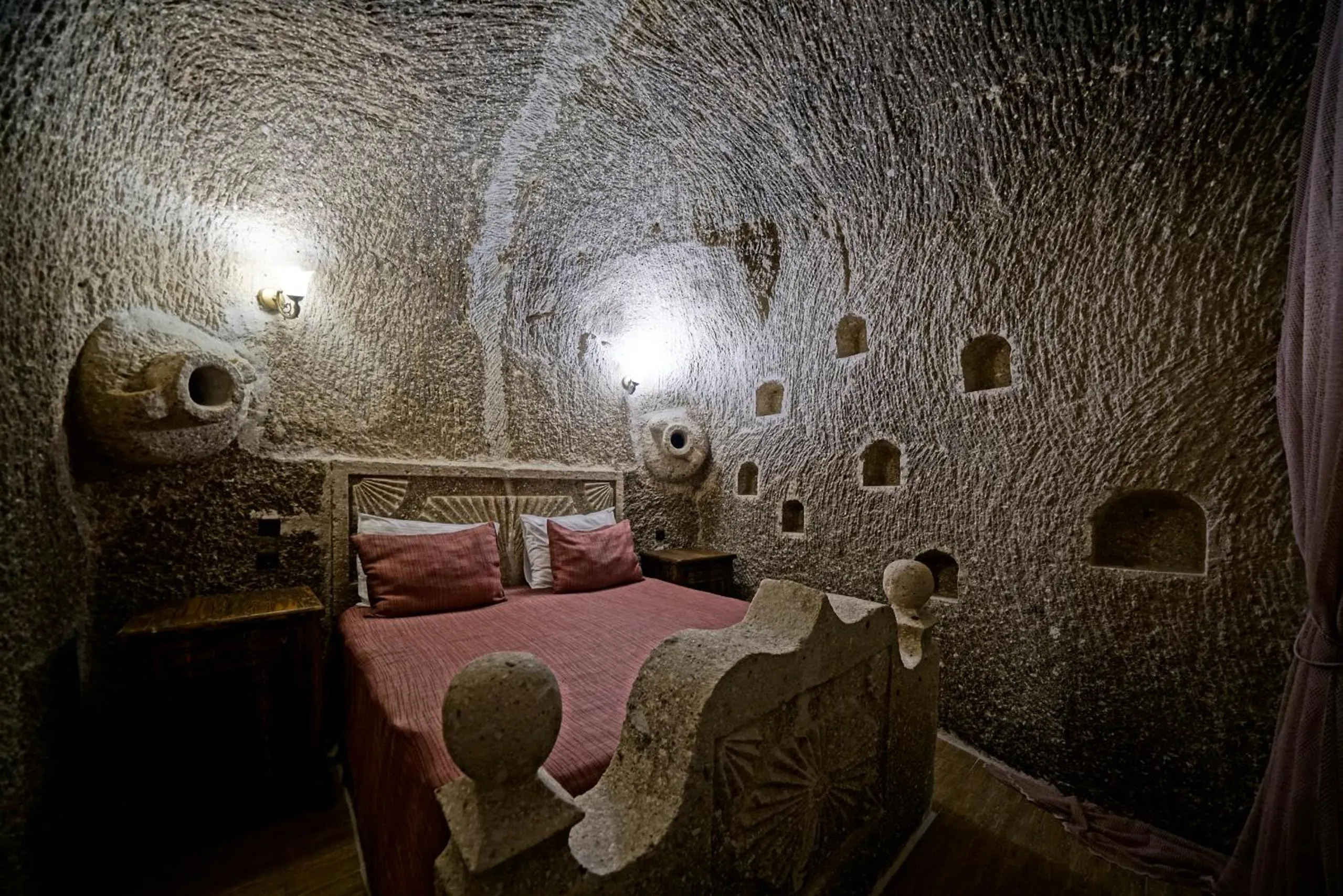Bed in Holiday Cave Hotel