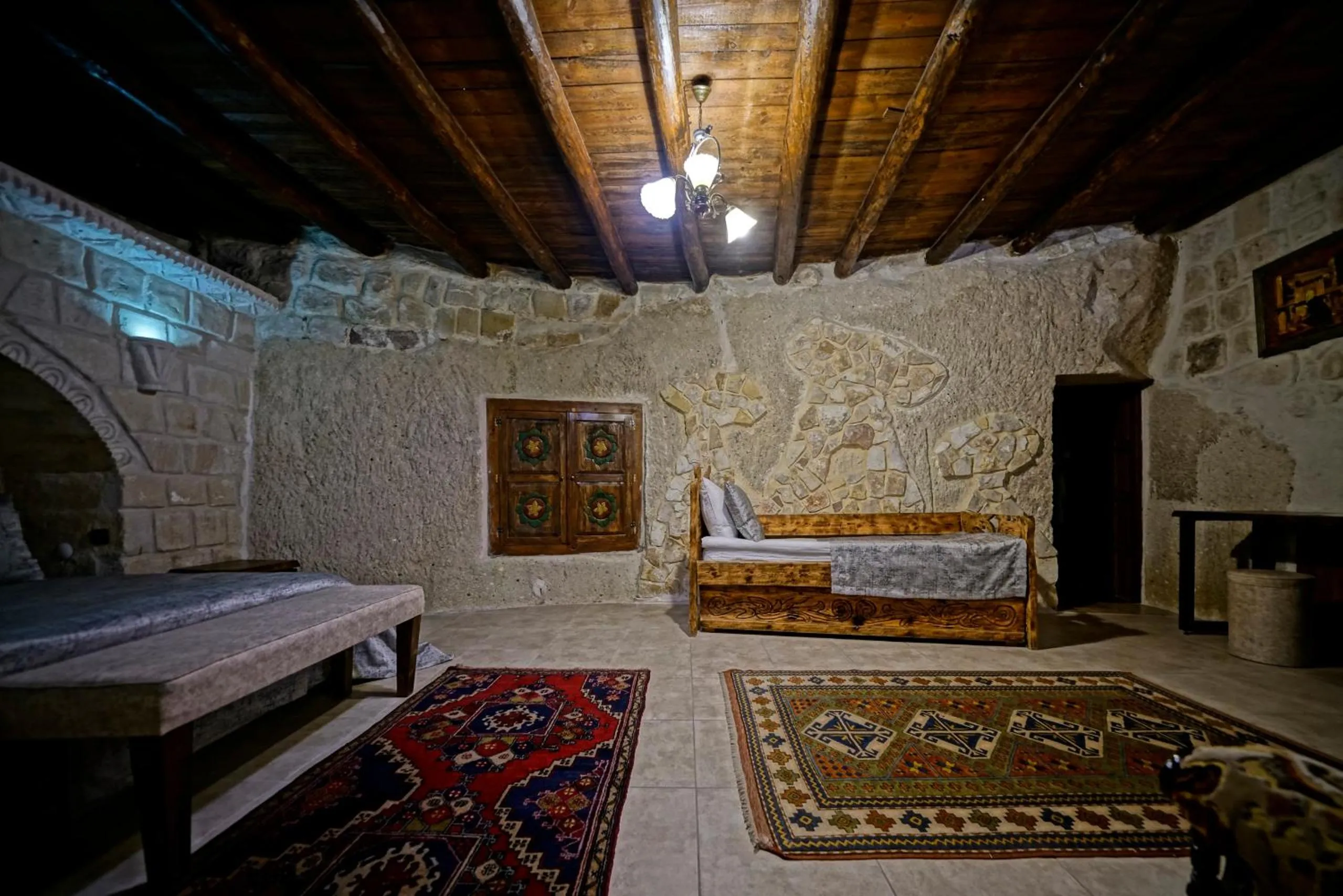 Bed in Holiday Cave Hotel