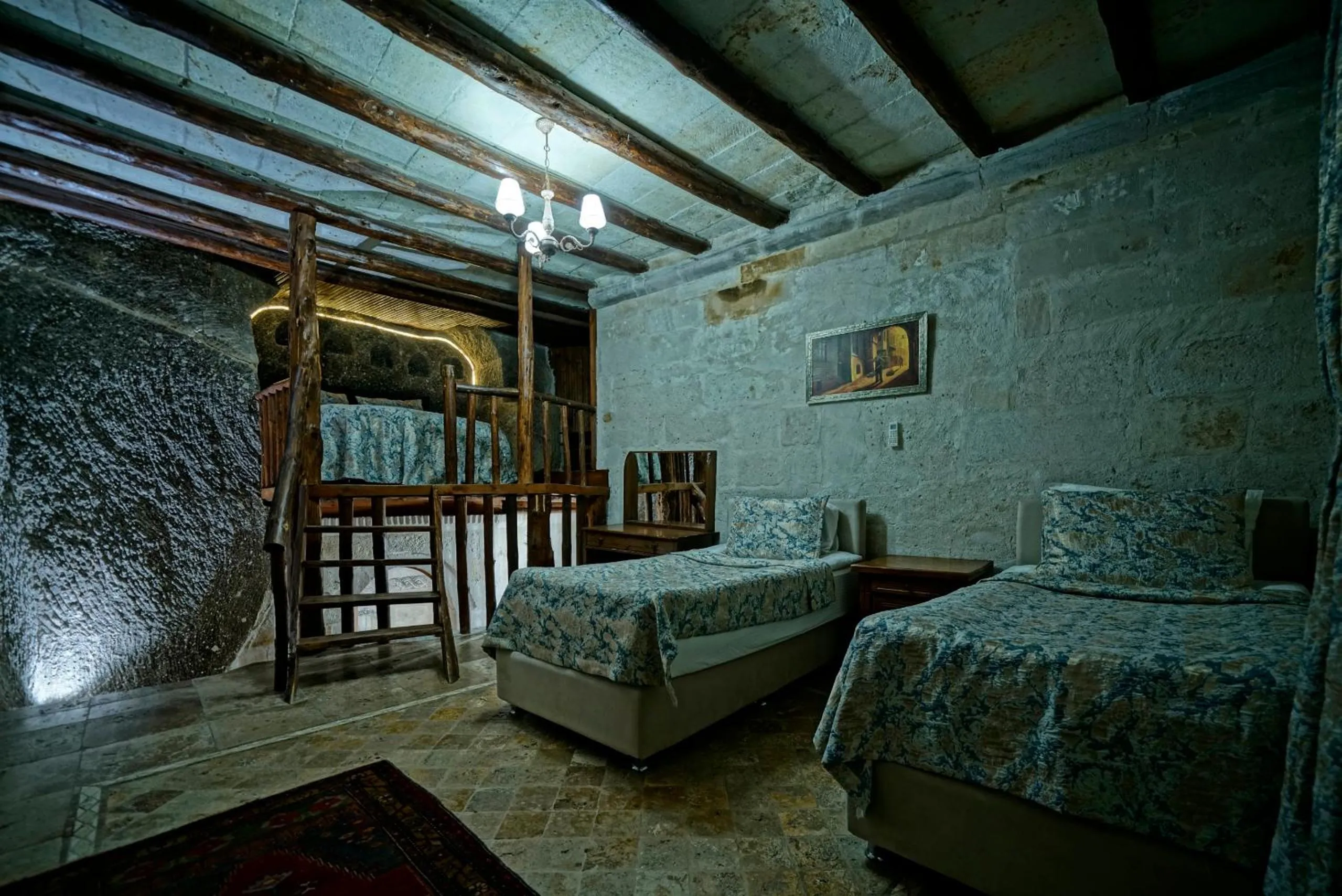 Photo of the whole room, Bed in Holiday Cave Hotel