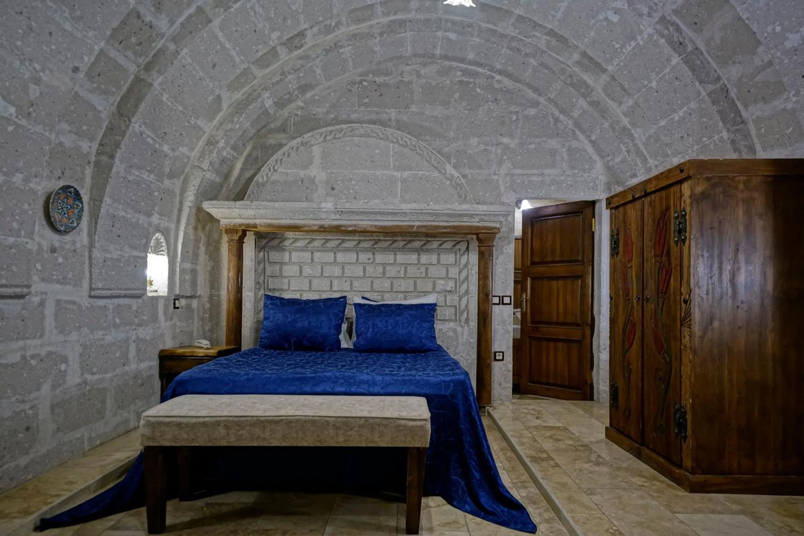 Bed in Holiday Cave Hotel