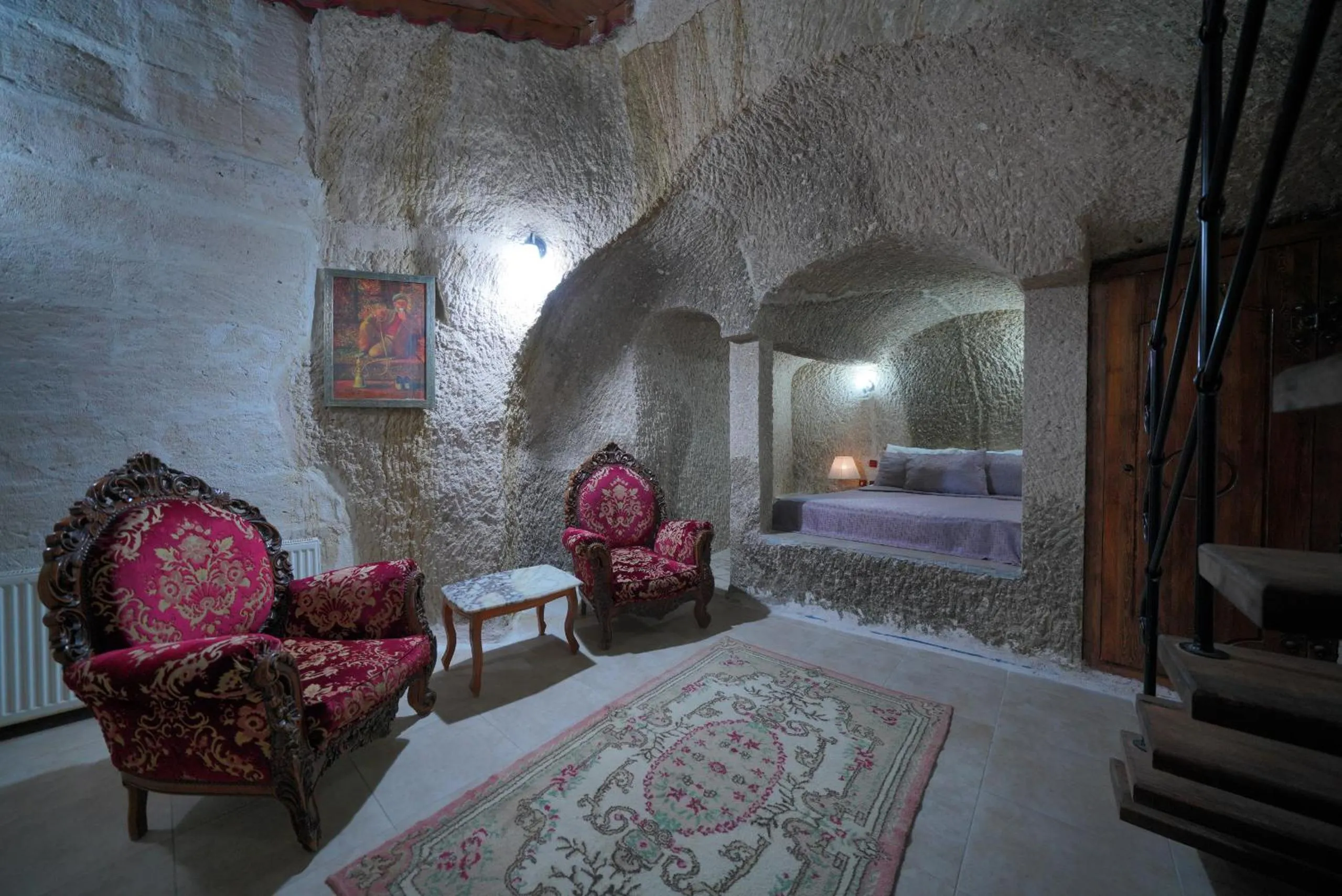 Bed in Holiday Cave Hotel