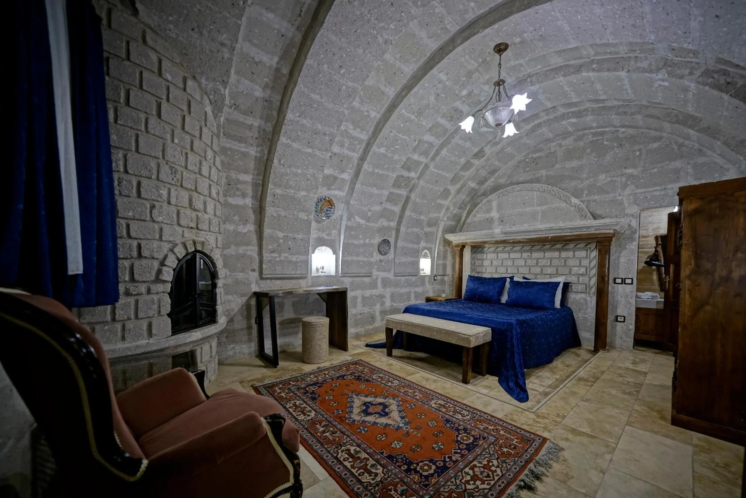 Bed in Holiday Cave Hotel