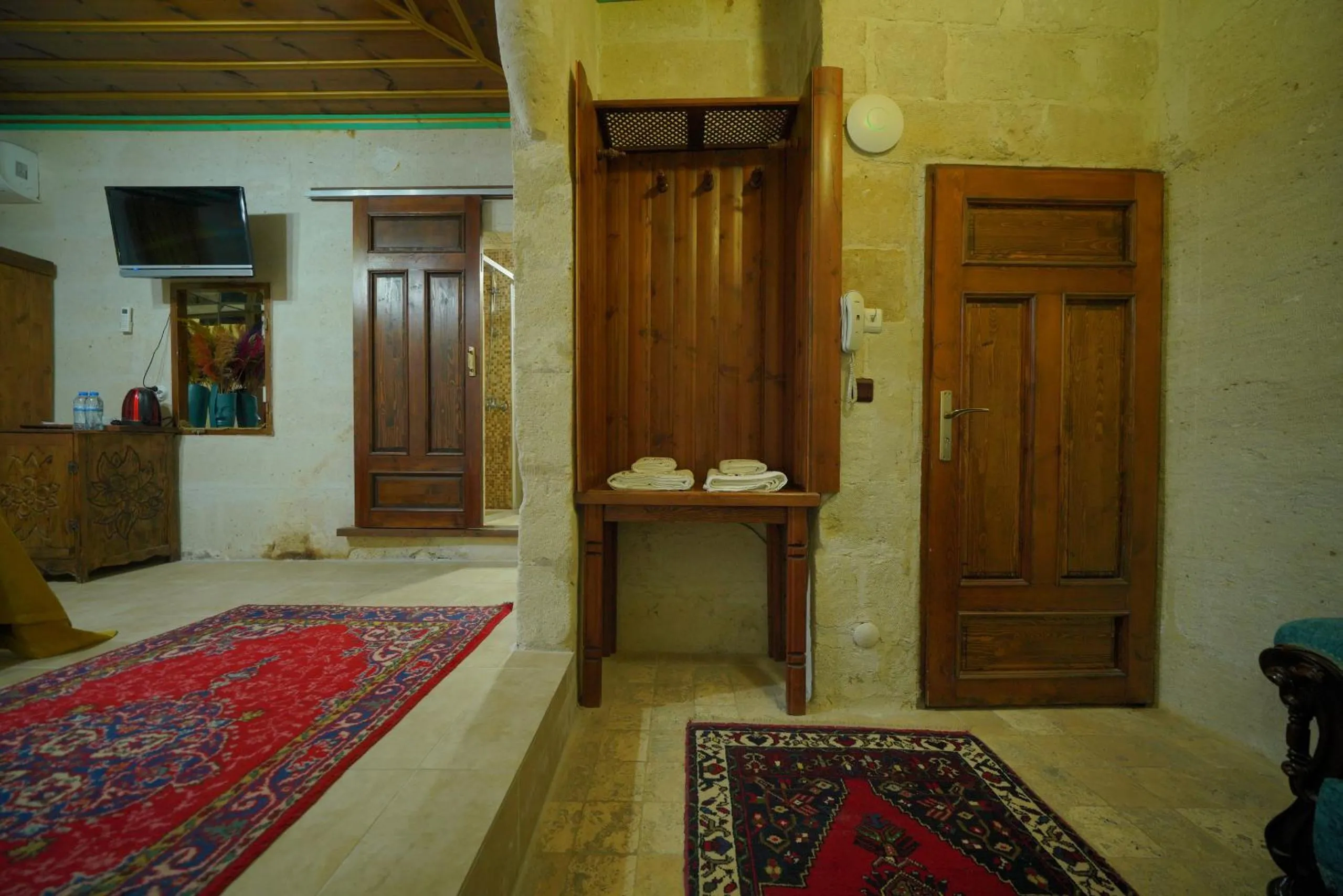 Bed in Holiday Cave Hotel