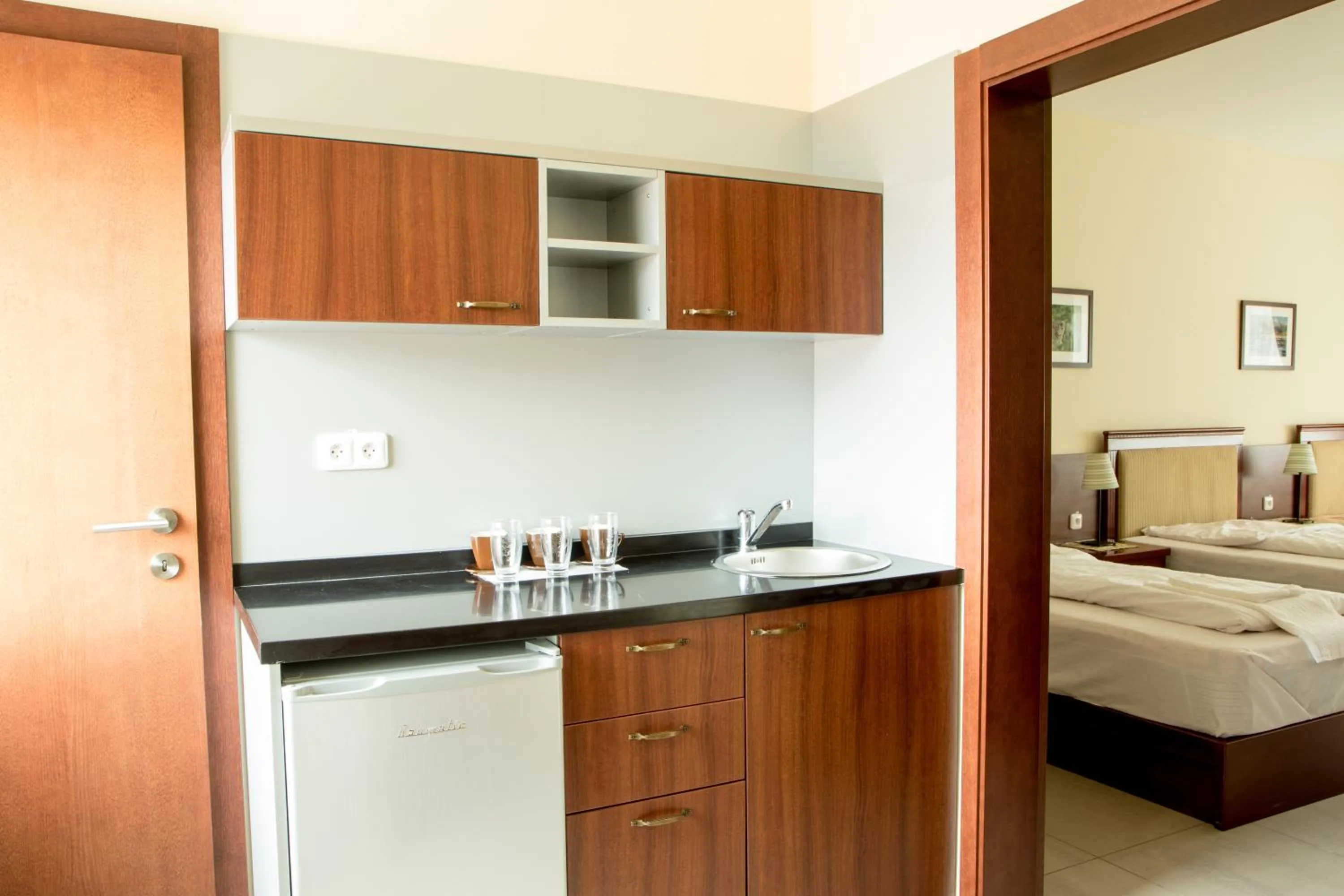 Kitchen or kitchenette, Bed in Penzion RAKI