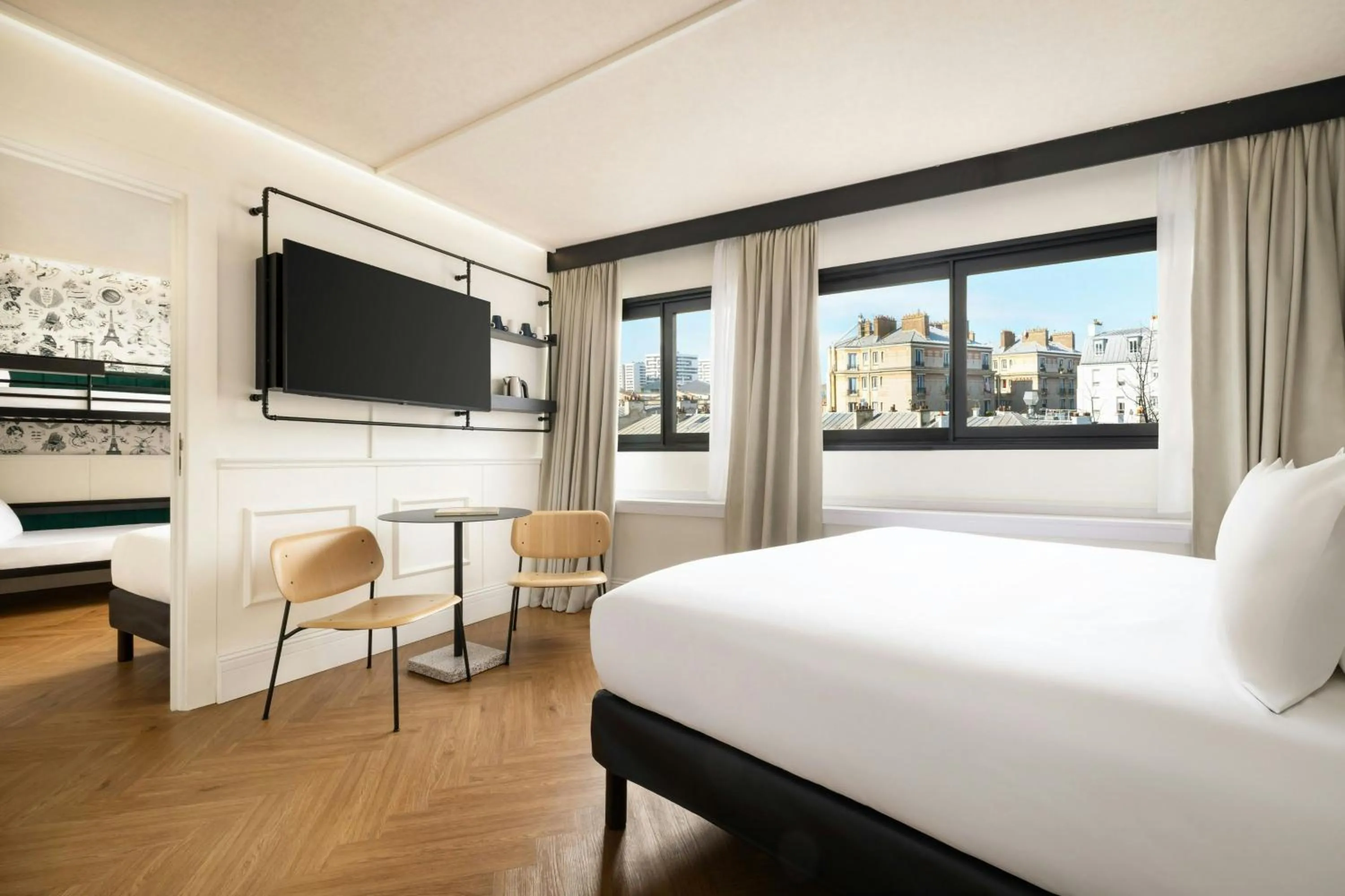Photo of the whole room, Bed in Moxy Paris La Villette