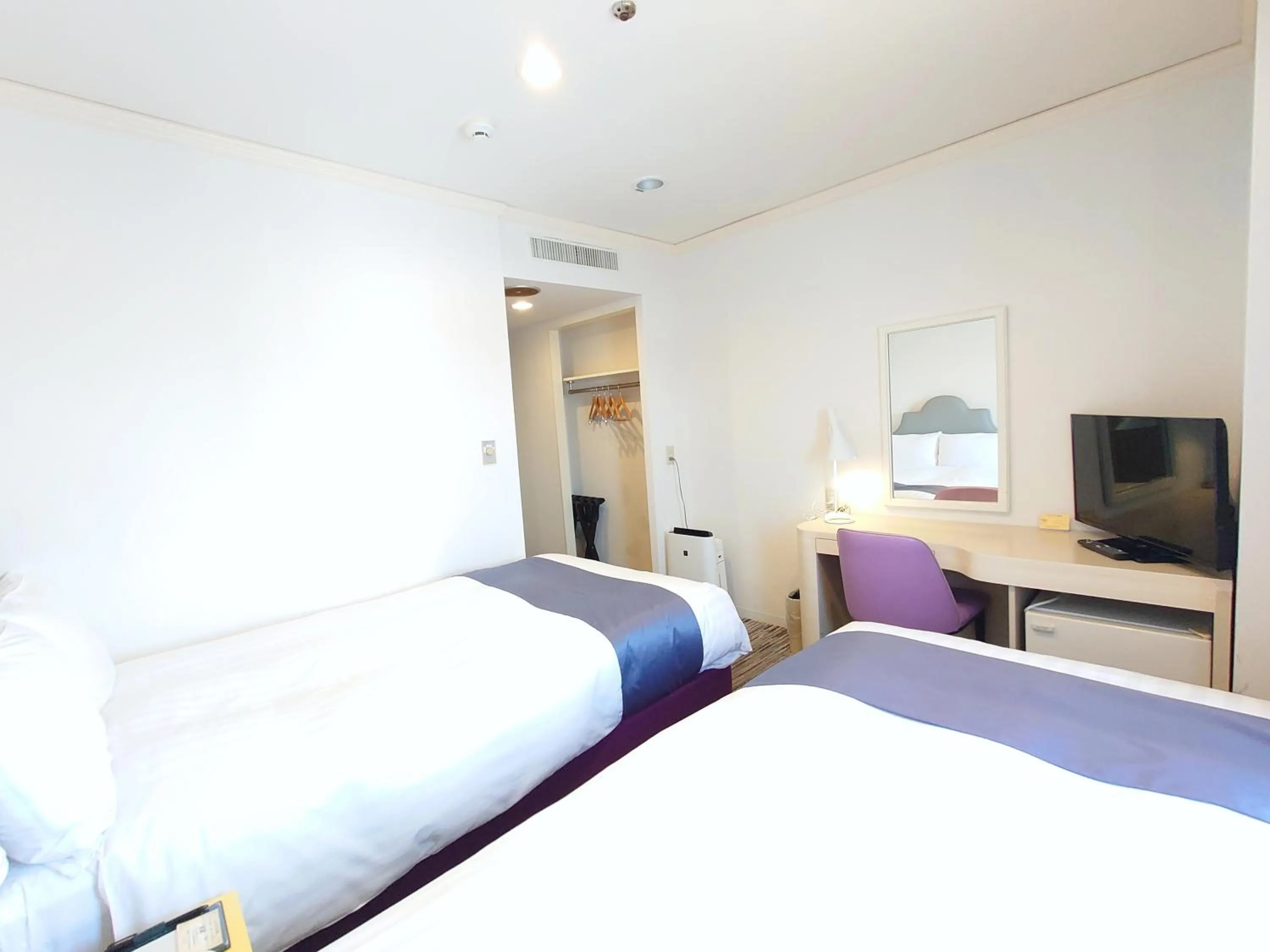 Bed in Hotel Montoview Yonezawa