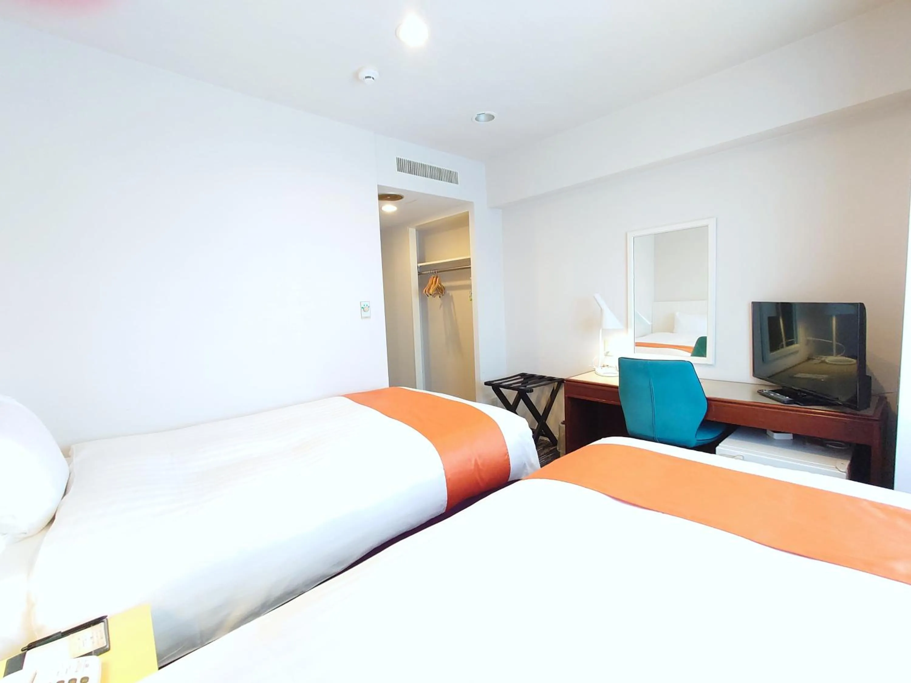 Bed in Hotel Montoview Yonezawa