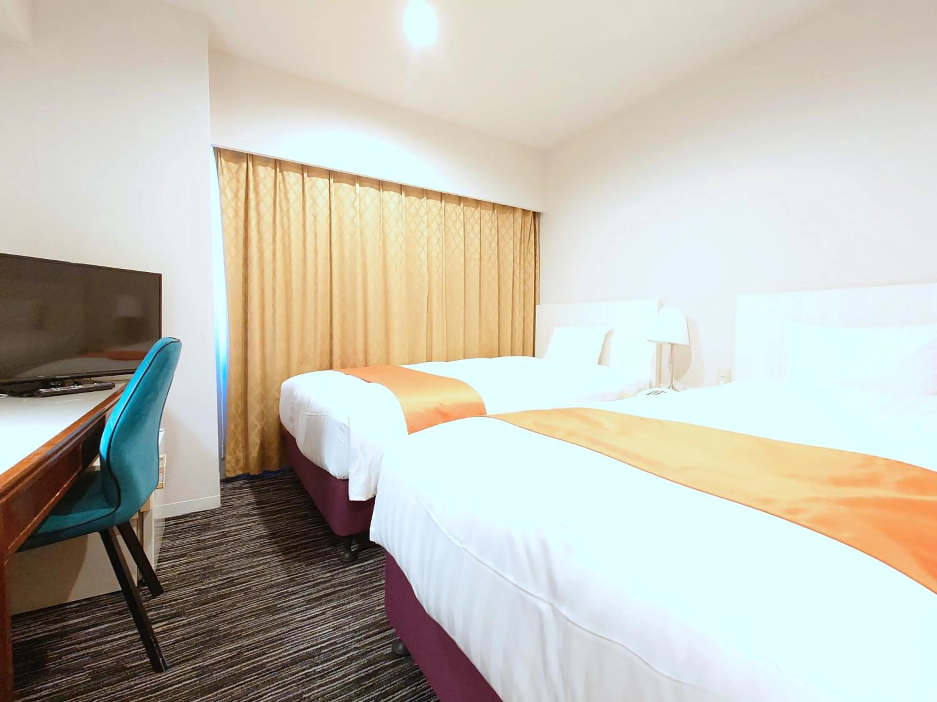 Bed in Hotel Montoview Yonezawa