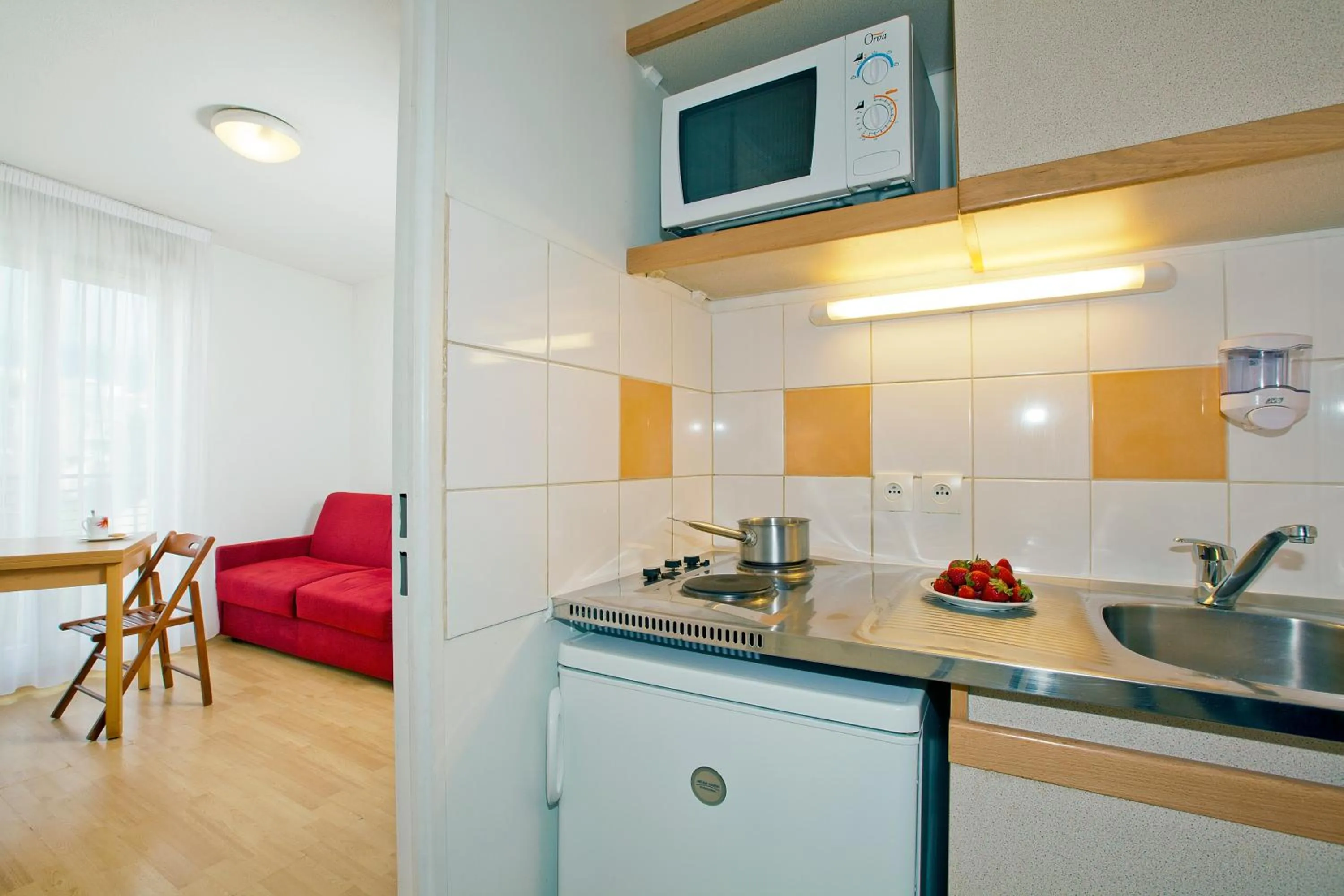 Kitchen or kitchenette in Séjours & Affaires Paris-Nanterre