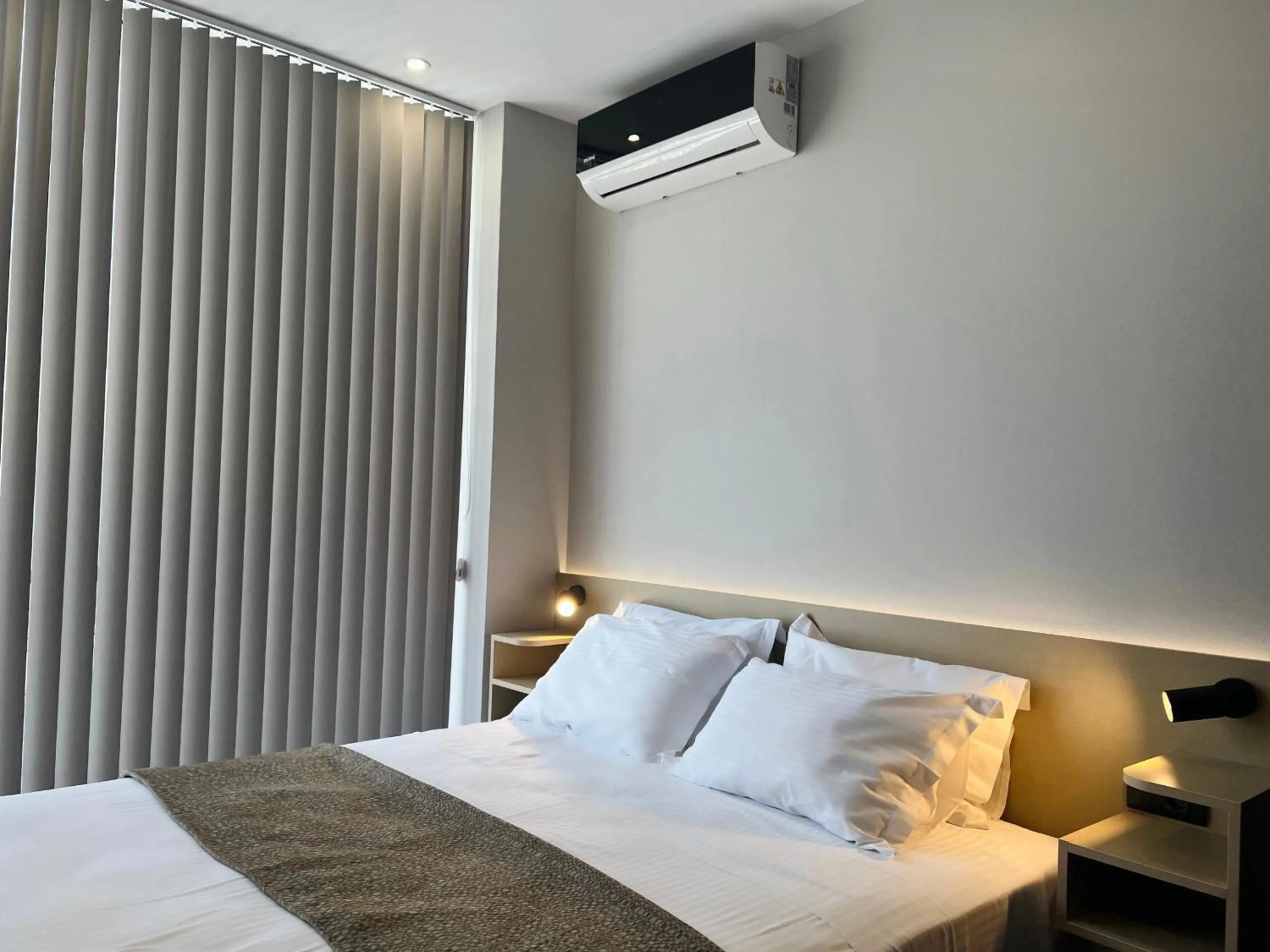 Bed in Penthouse & apartments by the Sea airport Airstay