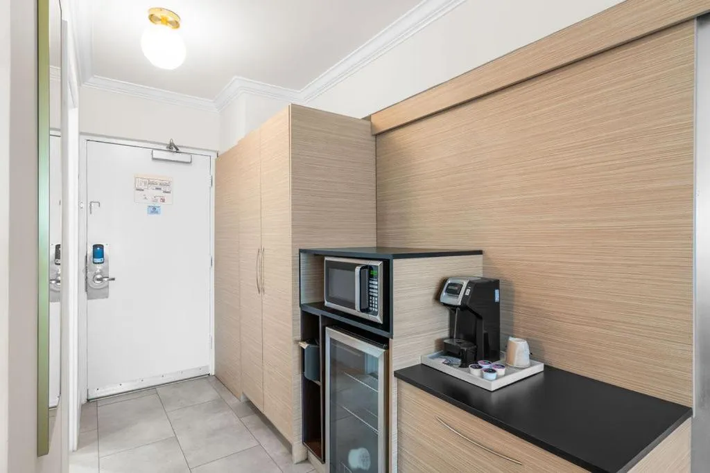 microwave in The Garden Hotel & Resort