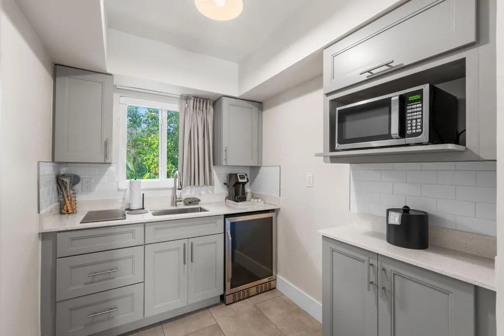 Kitchen or kitchenette in The Garden Hotel & Resort