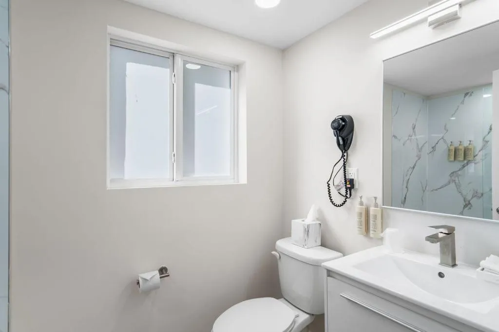 Toilet in The Garden Hotel & Resort