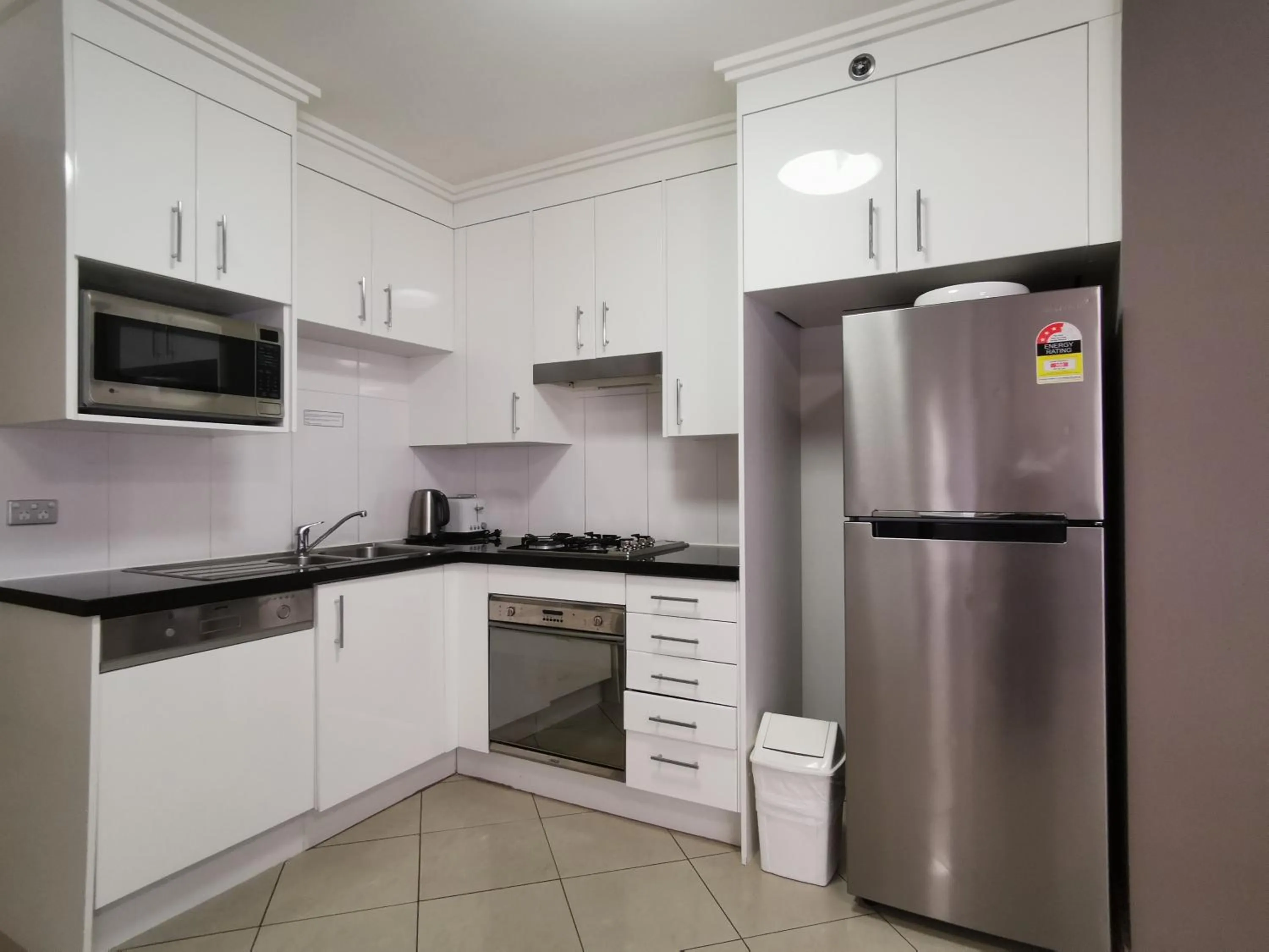 Kitchen or kitchenette in Fiori Apartments
