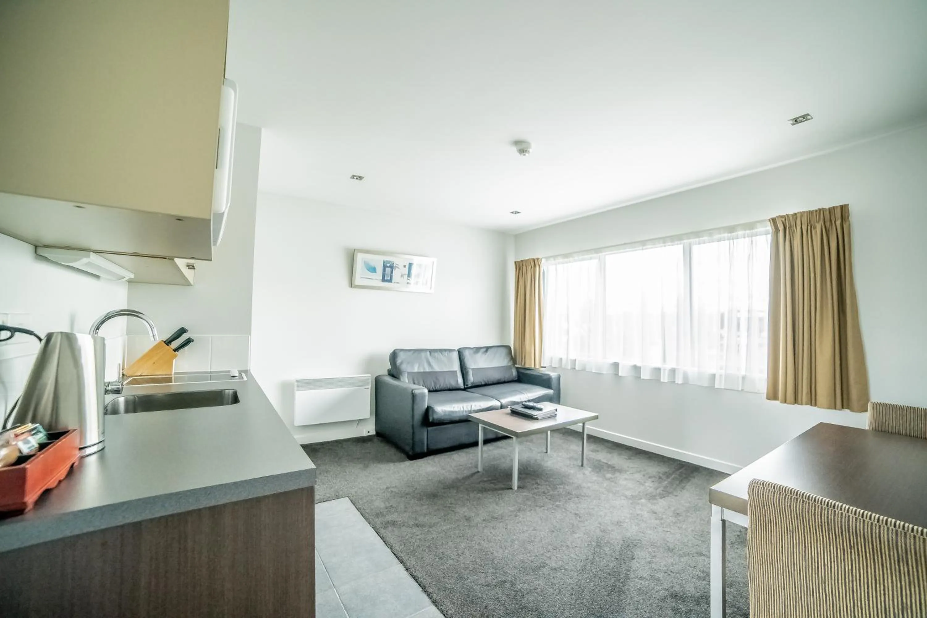 Living room in Airport Christchurch Motel