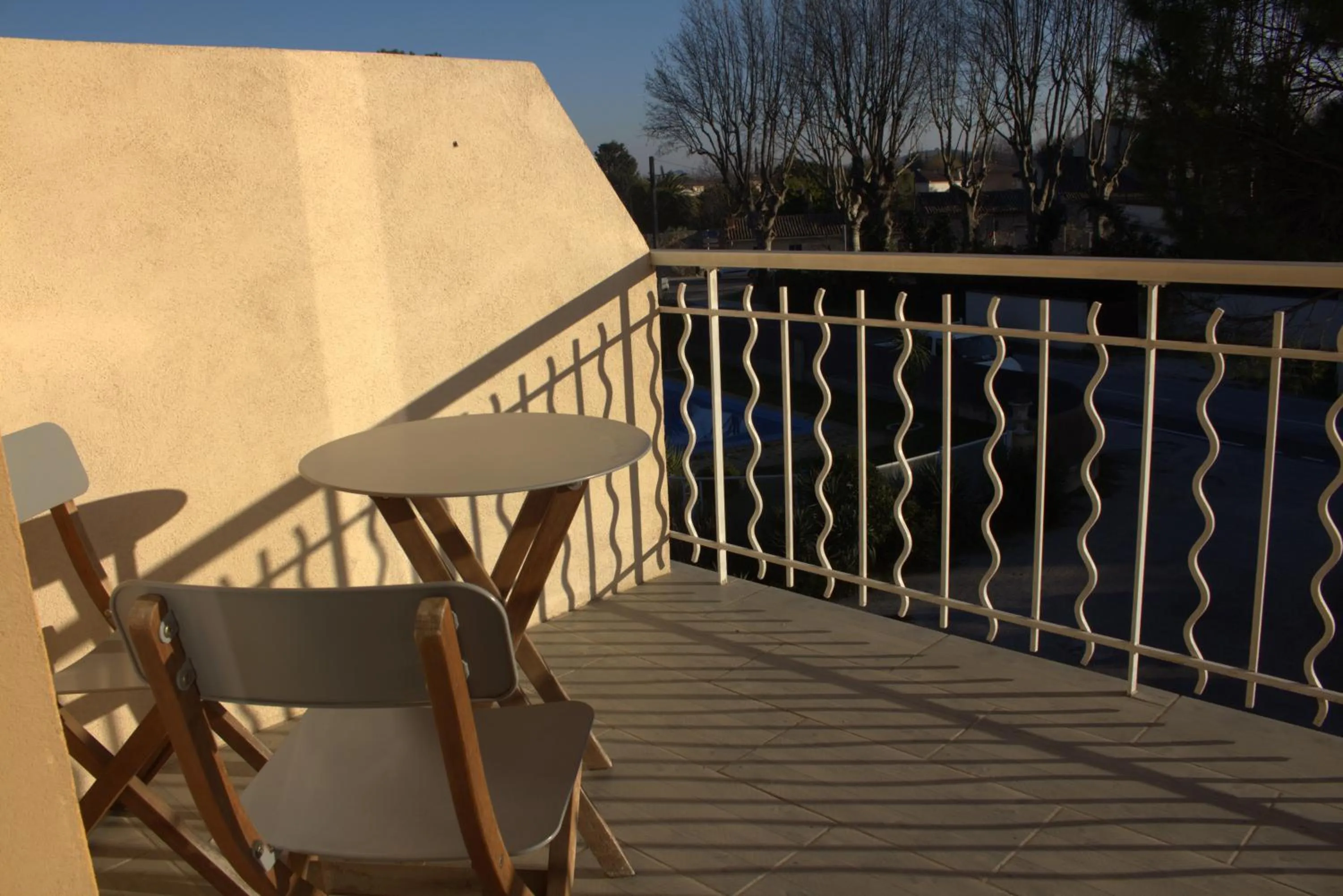 Patio in Logis Hôtel Le Clement V