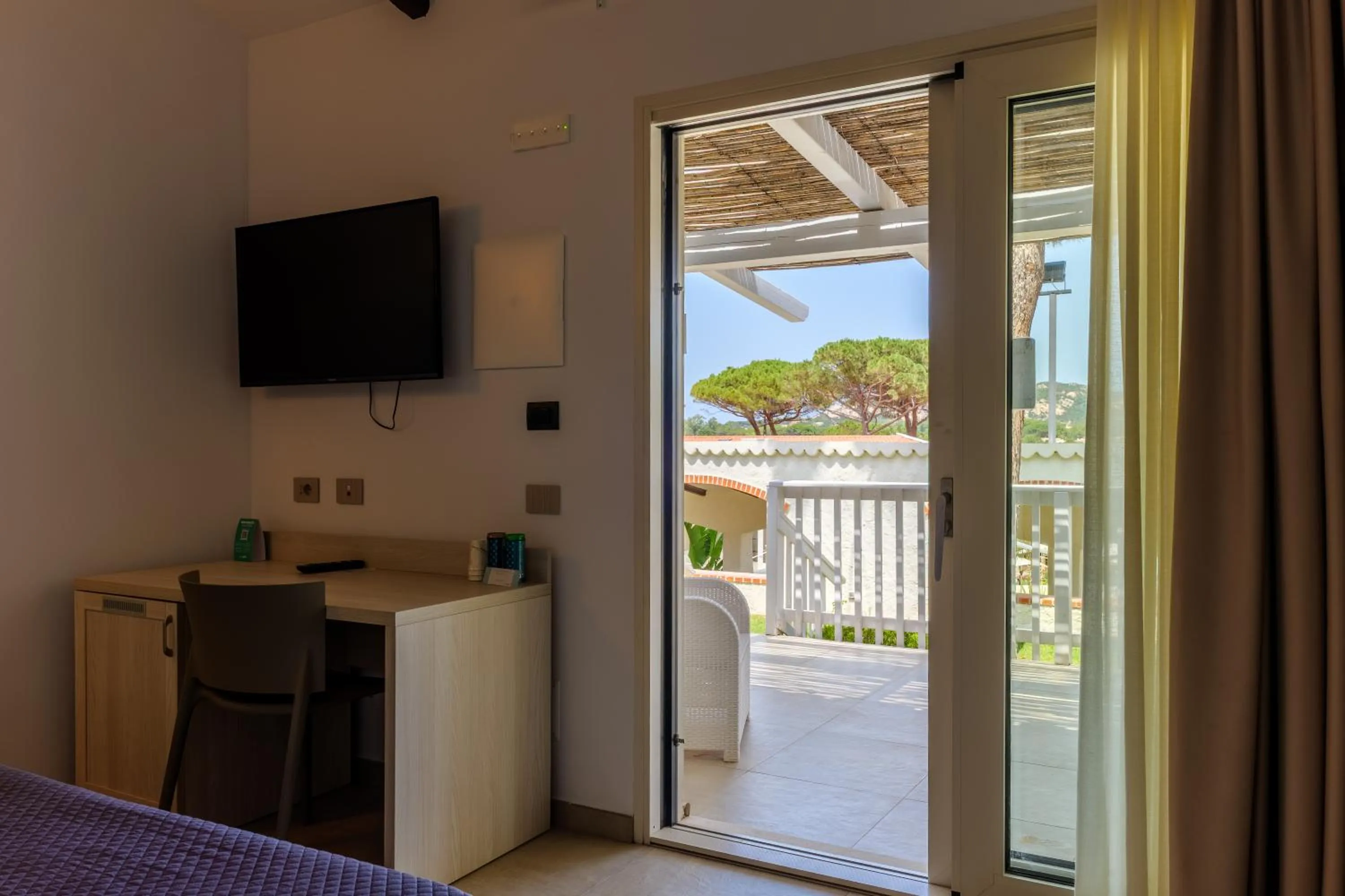 Bedroom in Club Esse Cala Bitta