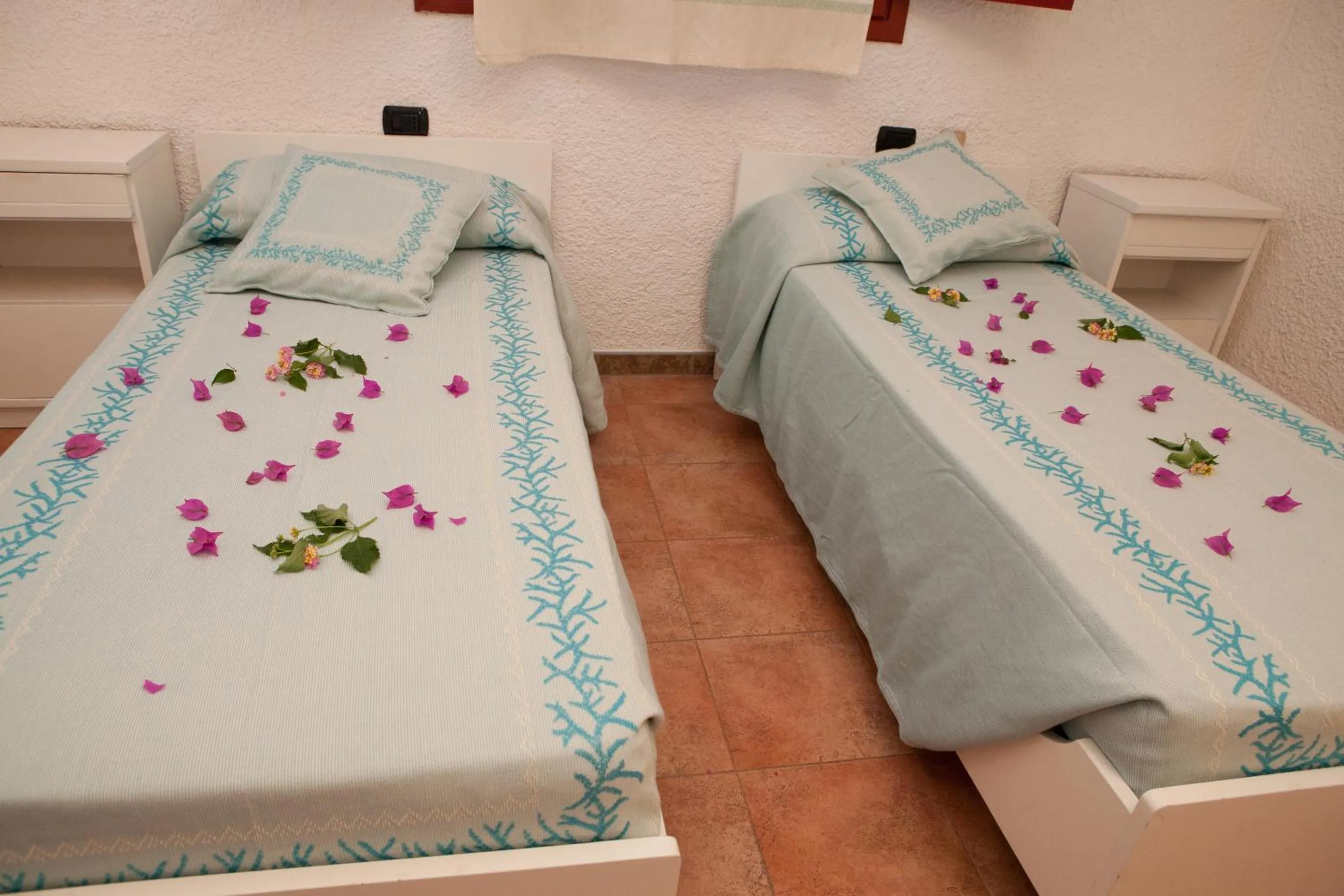 Photo of the whole room, Bed in Club Esse Cala Bitta