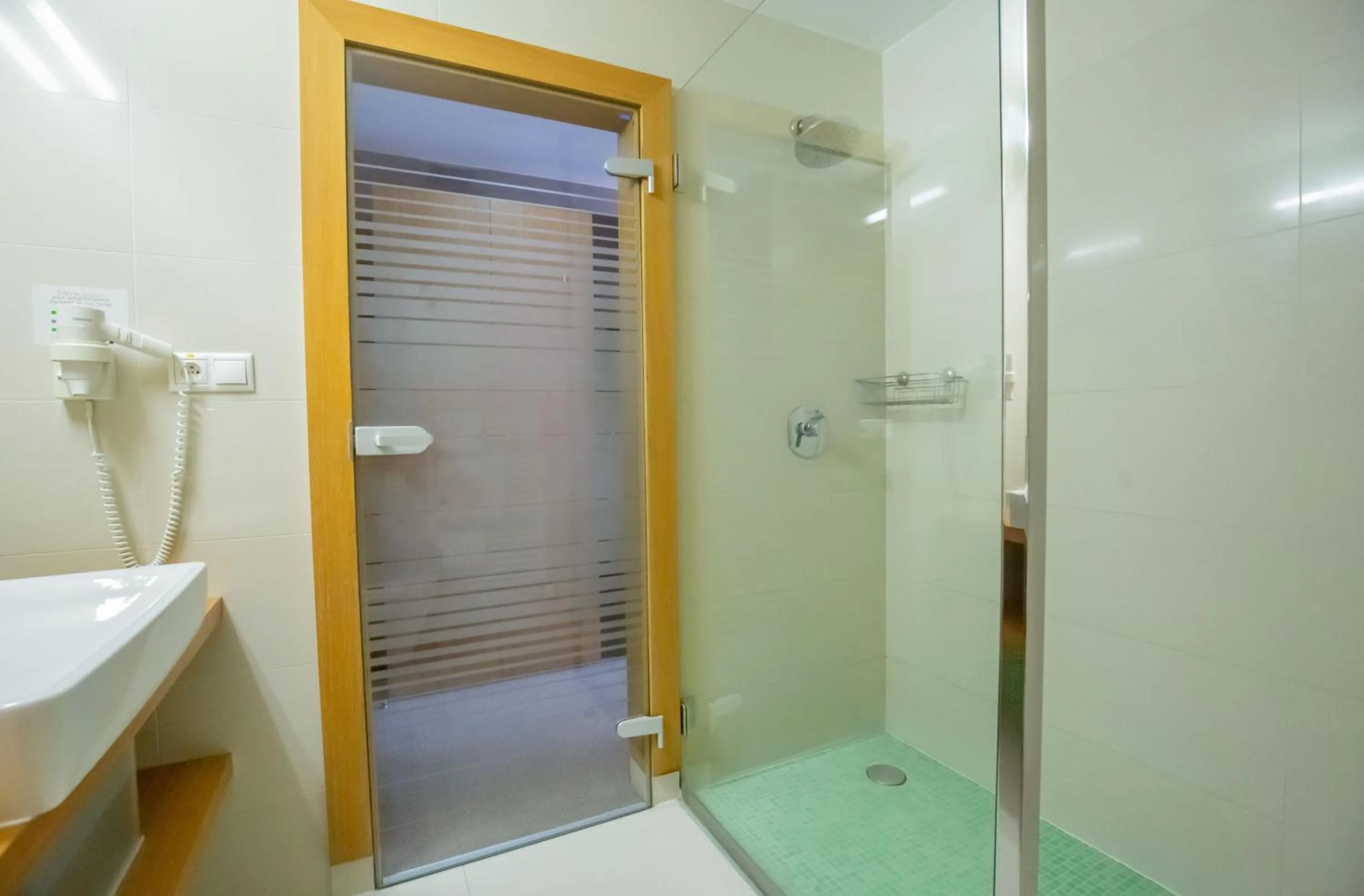 Shower in IMPIQ Hotel