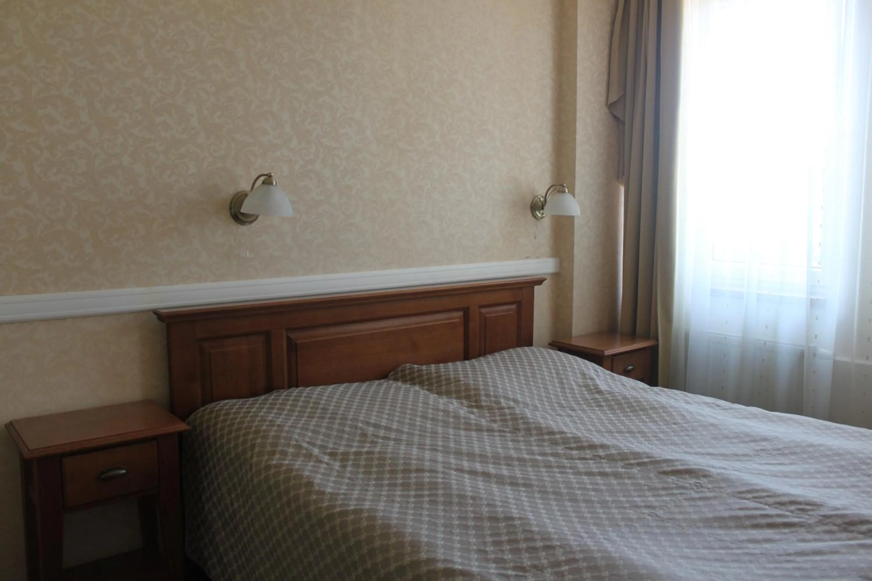 Bed in Hotel Dominika