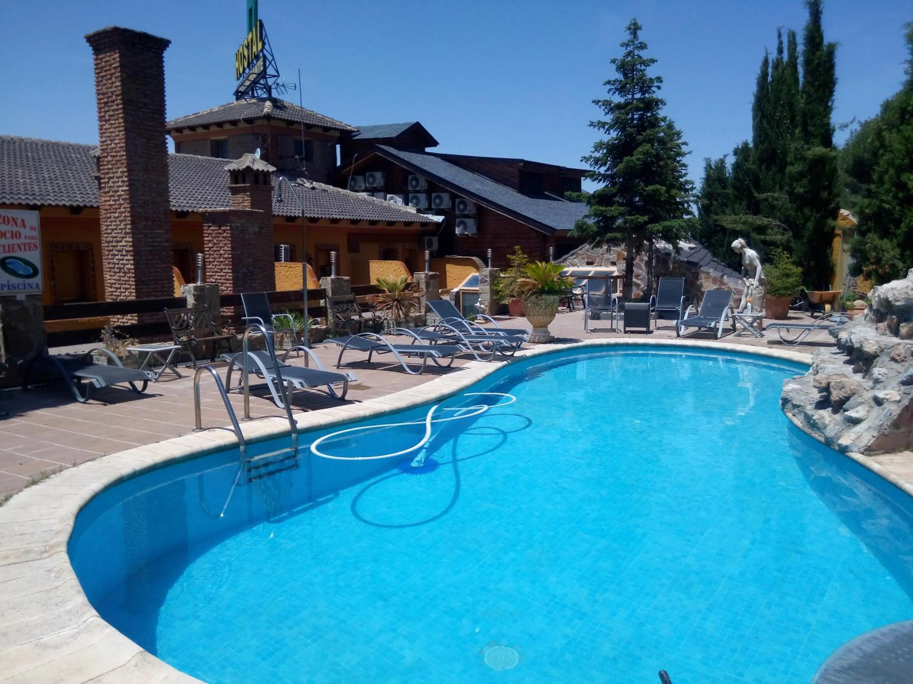 Swimming pool in Hostal Sierra De Baza