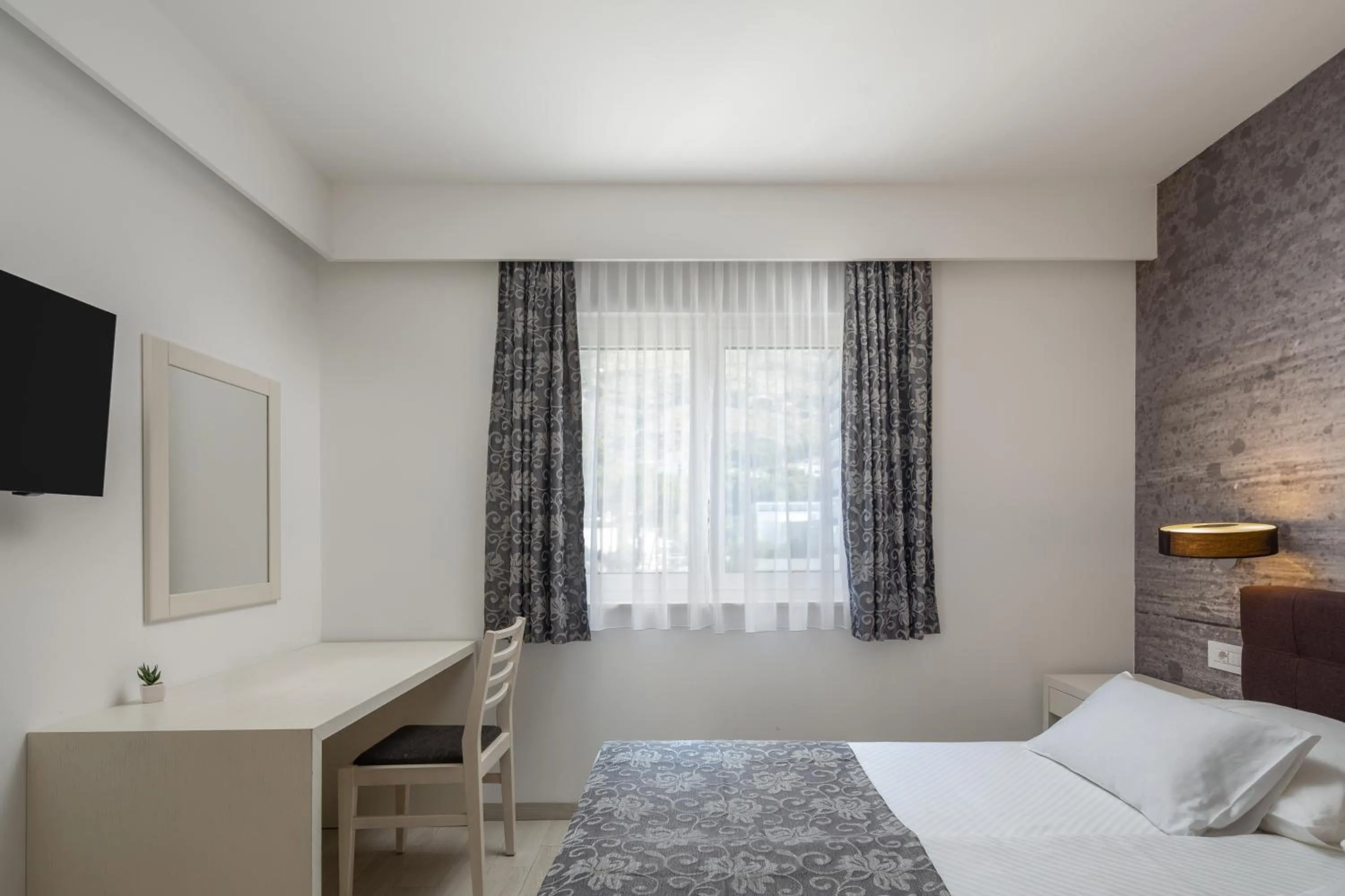 Bed in Hotel Tamaris