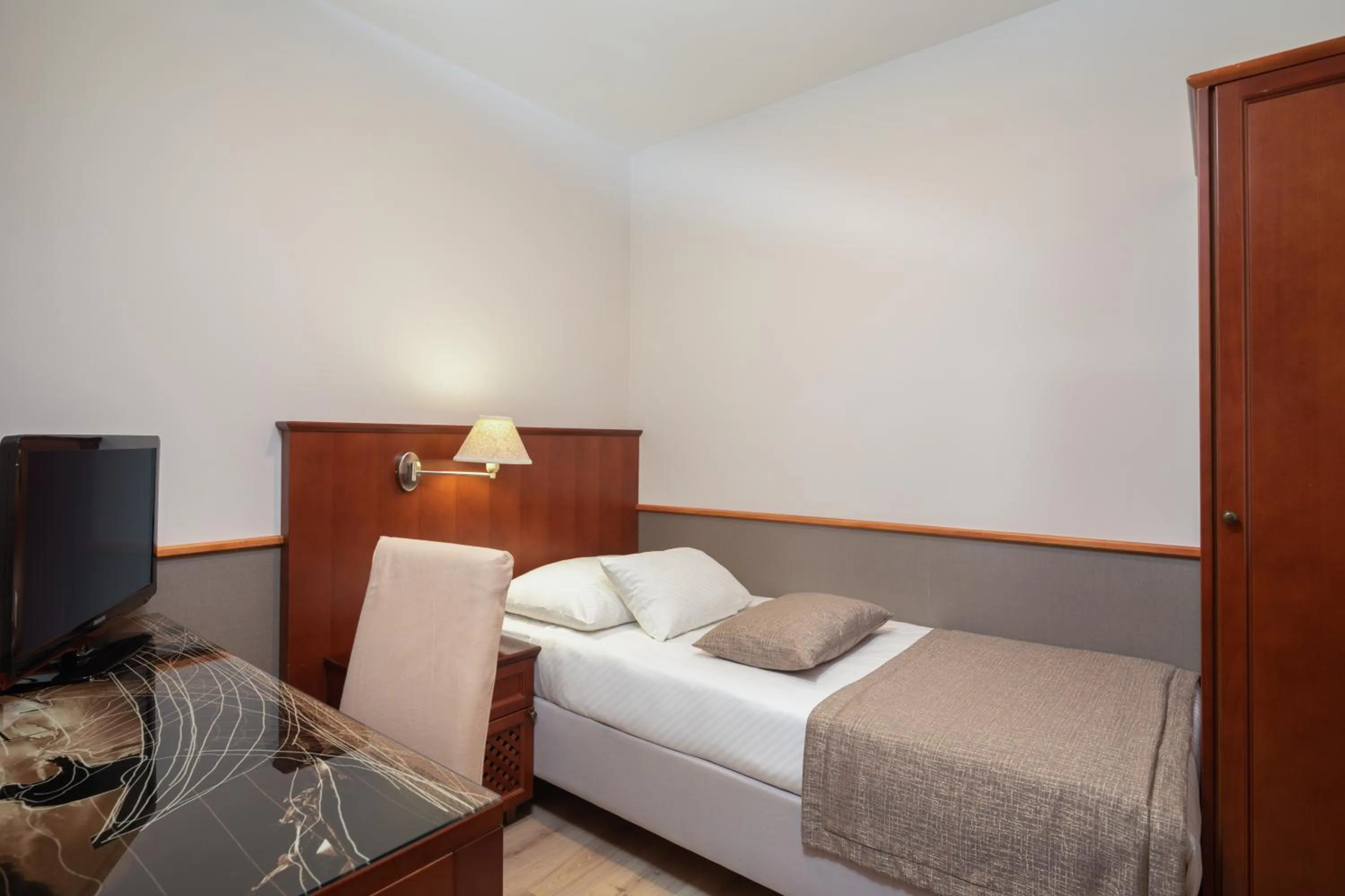 Bed in Hotel Tamaris