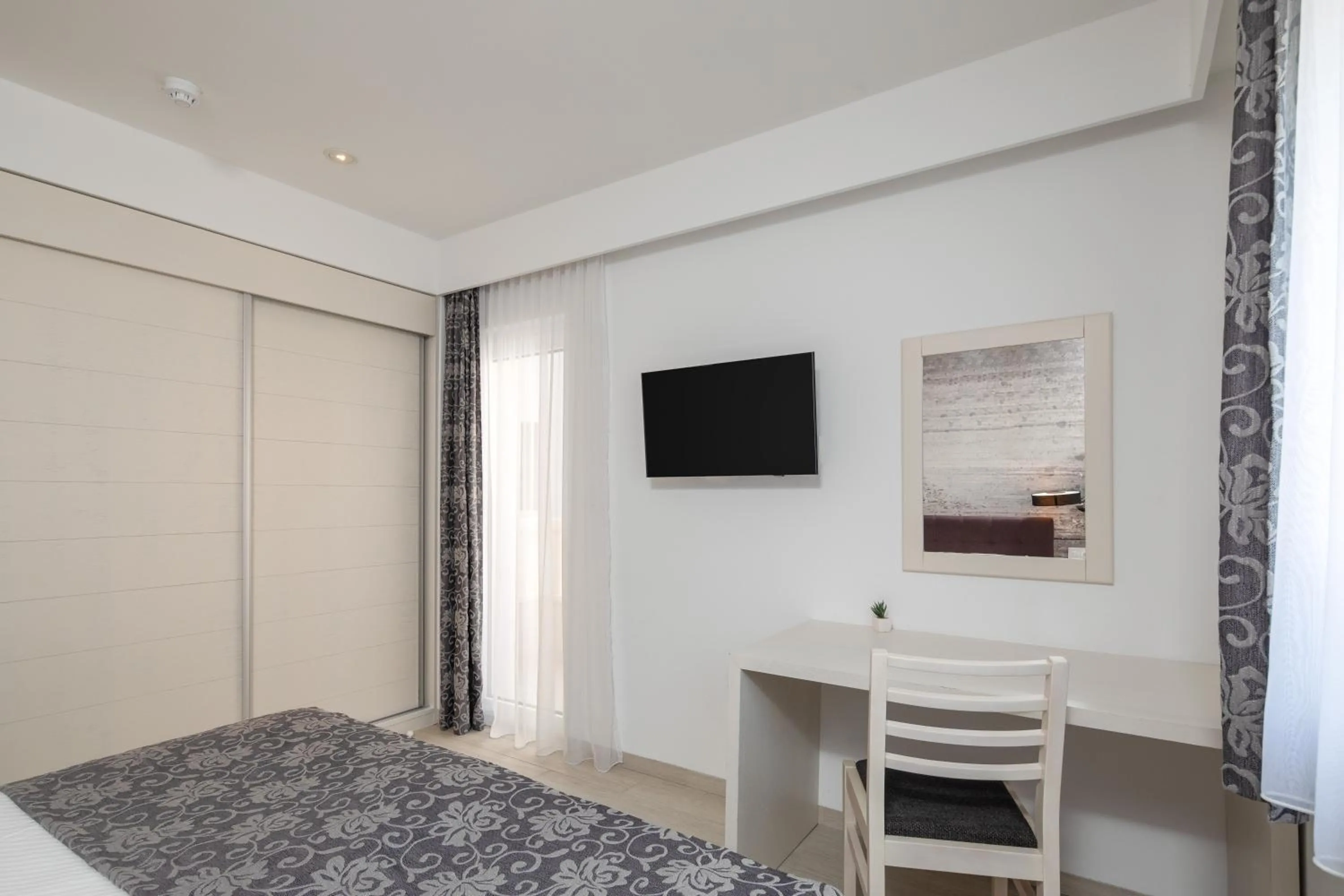 Bed in Hotel Tamaris