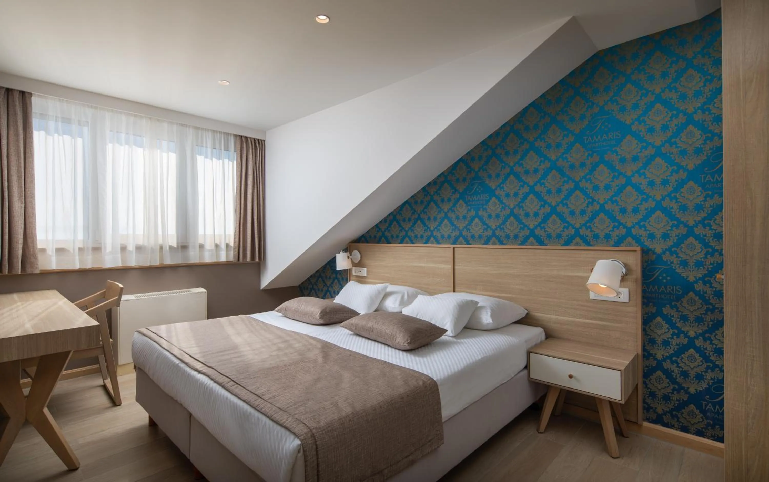 Bed in Hotel Tamaris