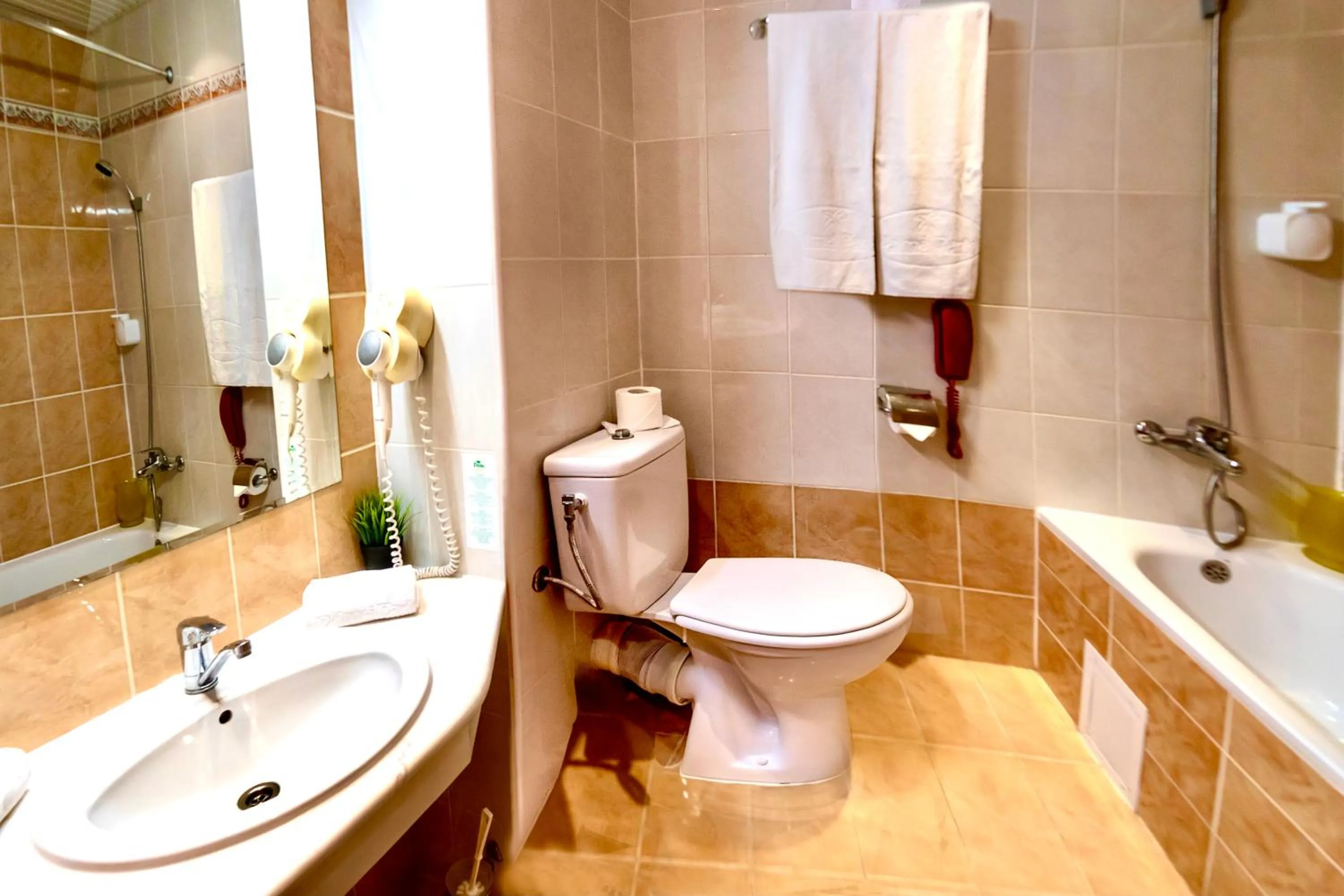 Bathroom in Palm Beach Hotel - All Inclusive with Free beach package & Private Beach