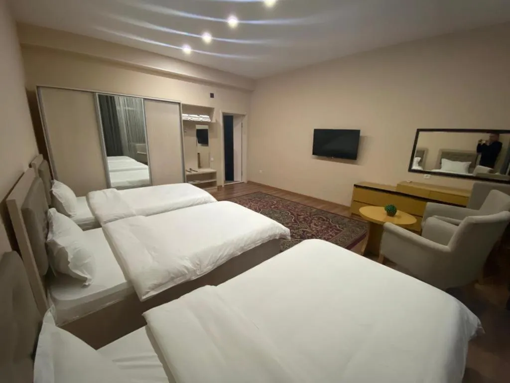 Bed in Sunrise Apartments