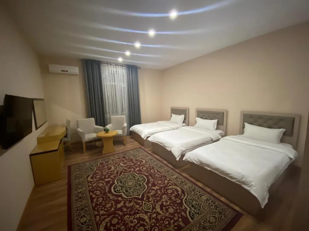 Bed in Sunrise Apartments