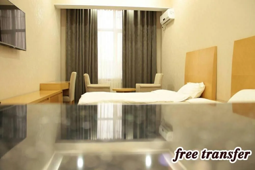 Bed in Sunrise Apartments