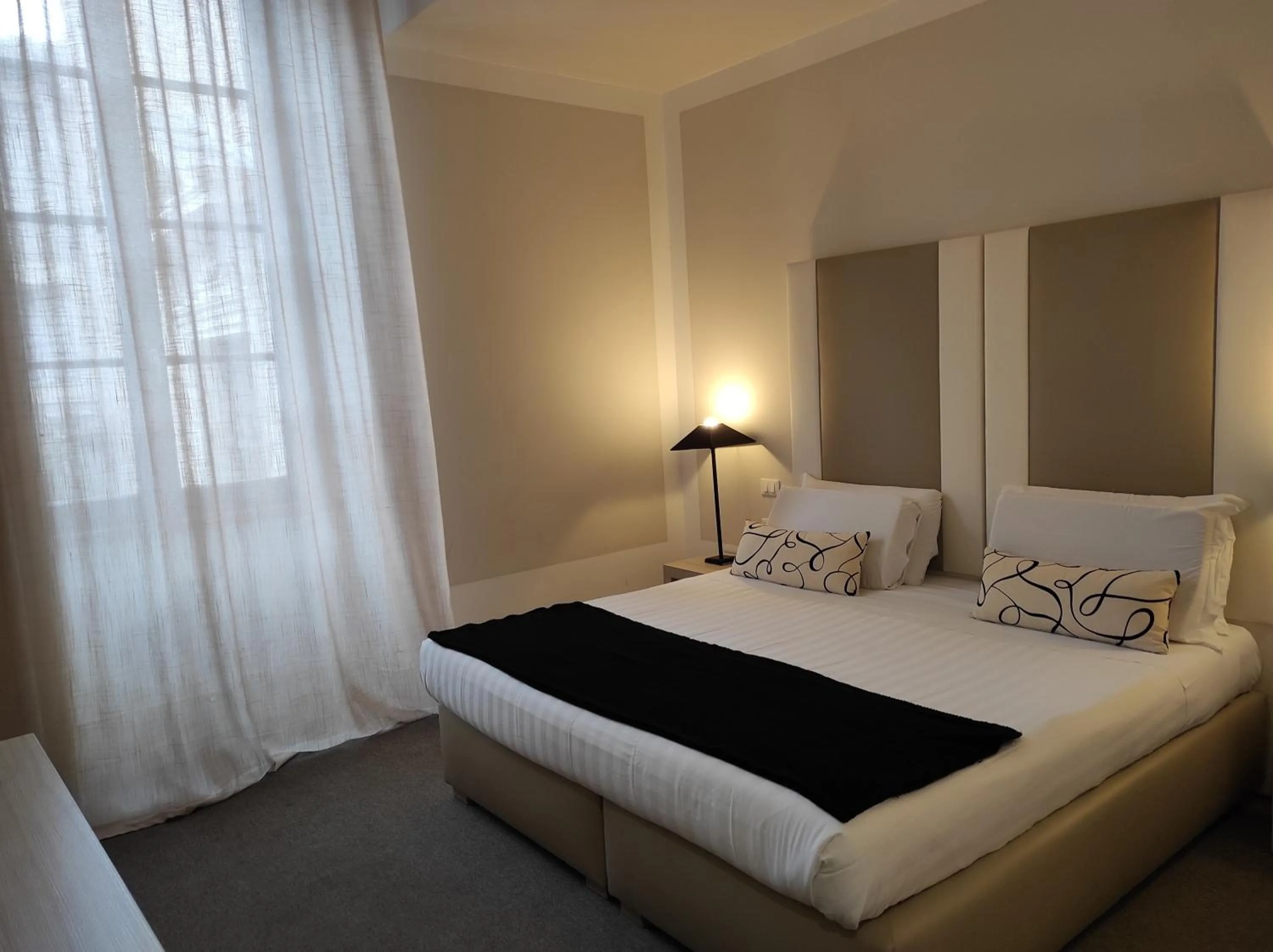 Bed in Relais Santa Maria Maggiore