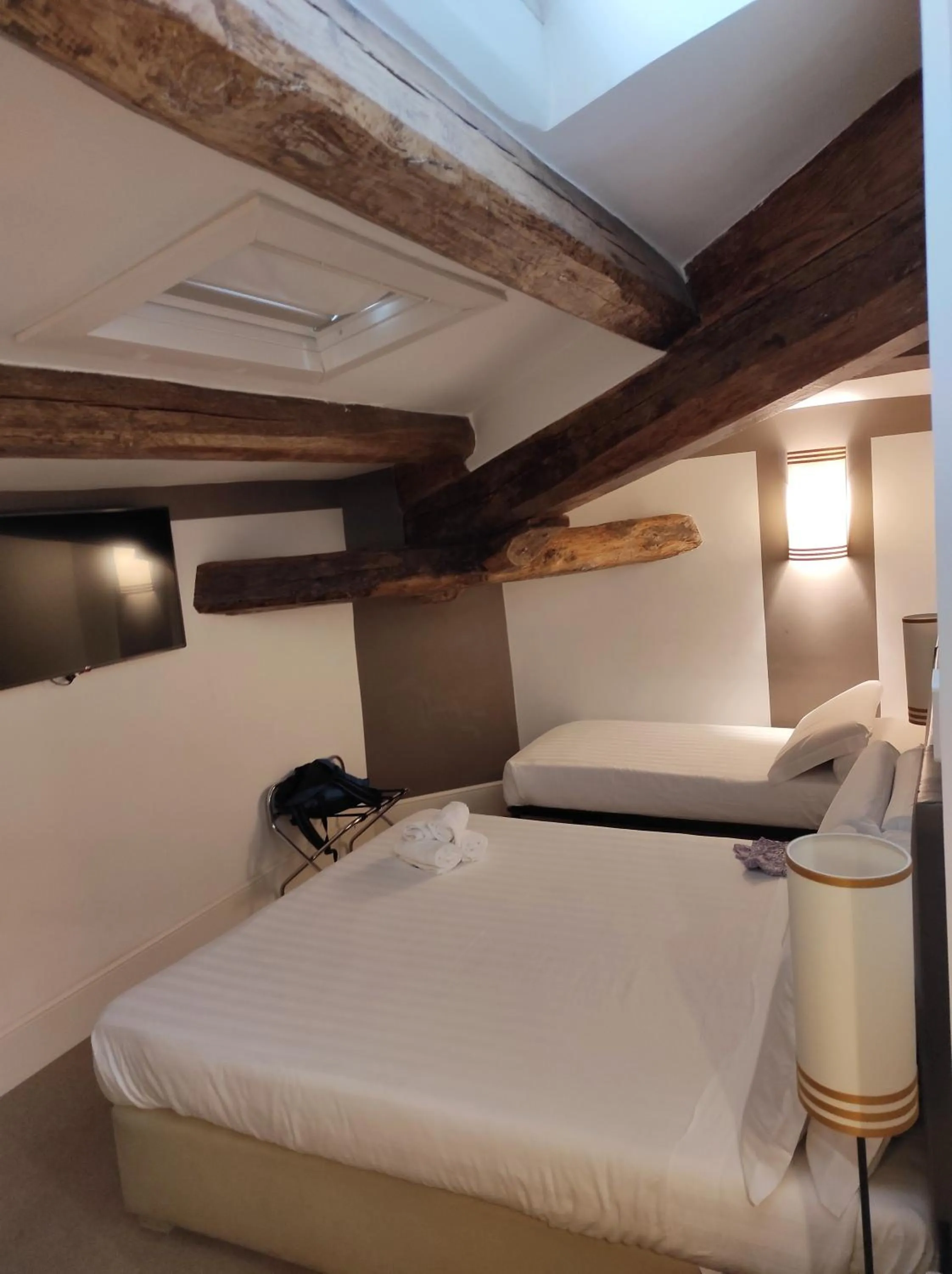 Bed in Relais Santa Maria Maggiore