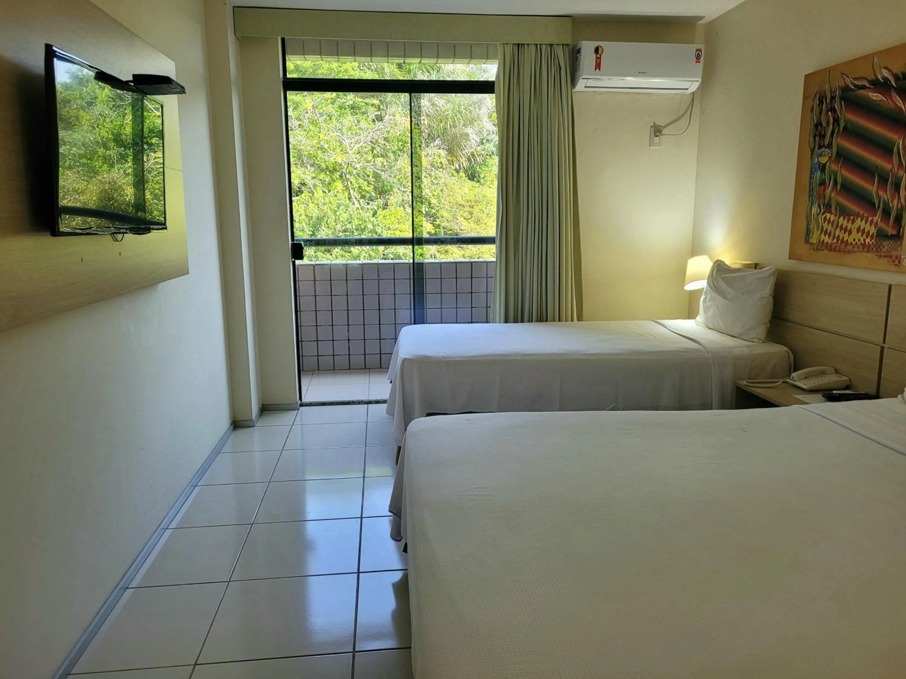 Bed in Praiabella Hotel