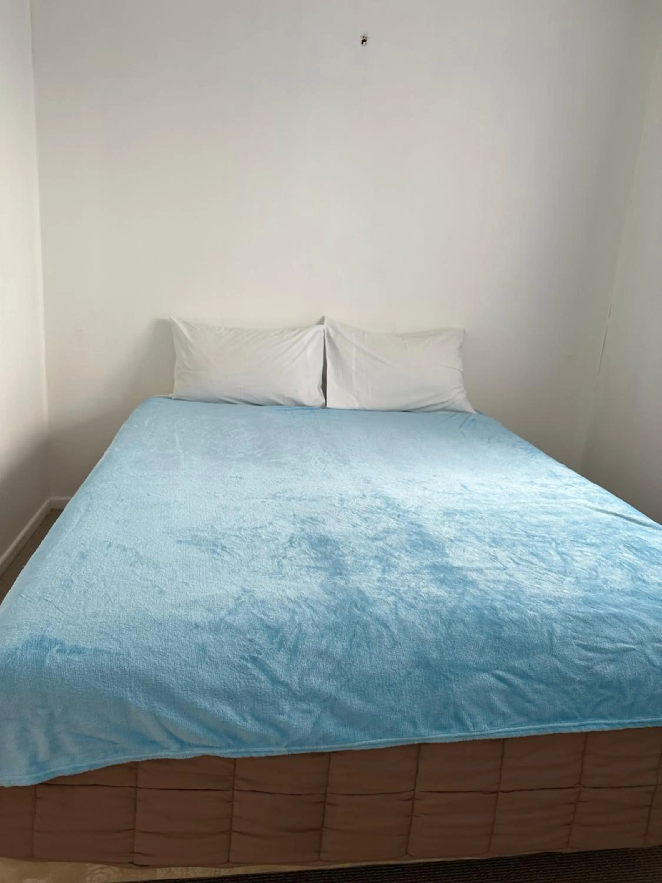 Bed in MALFROY Motor Lodge Rotorua