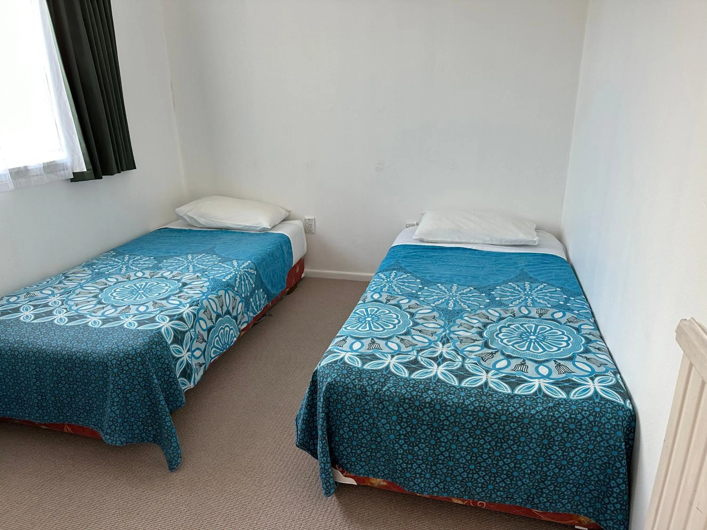 Bed in MALFROY Motor Lodge Rotorua