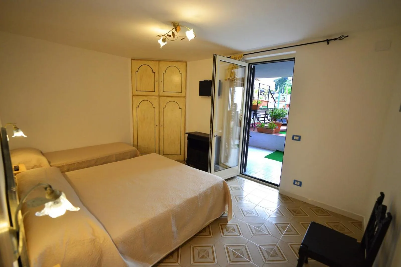 Bedroom in Al Geranio B&B
