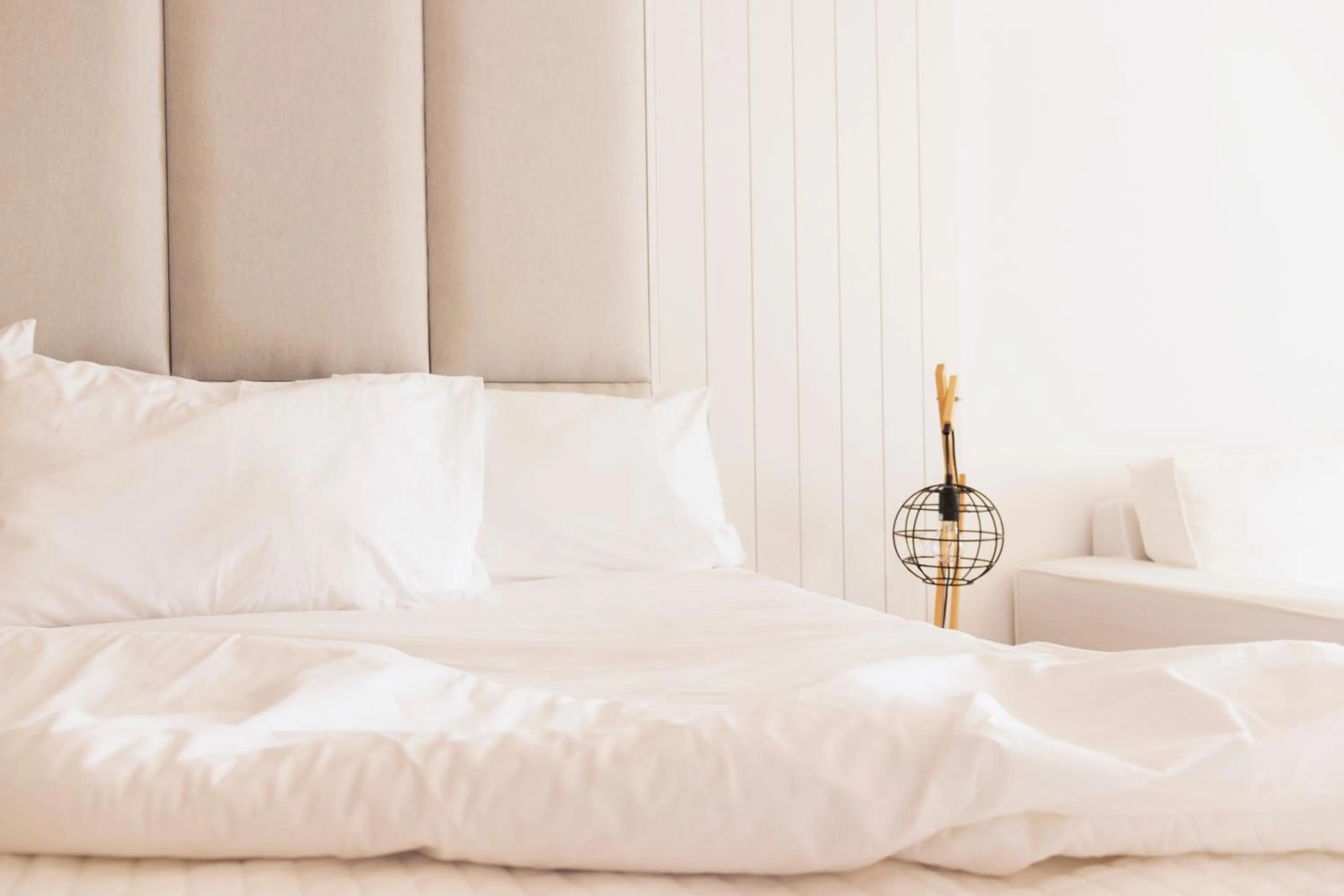 Bed in Astro Palace Hotel & Suites