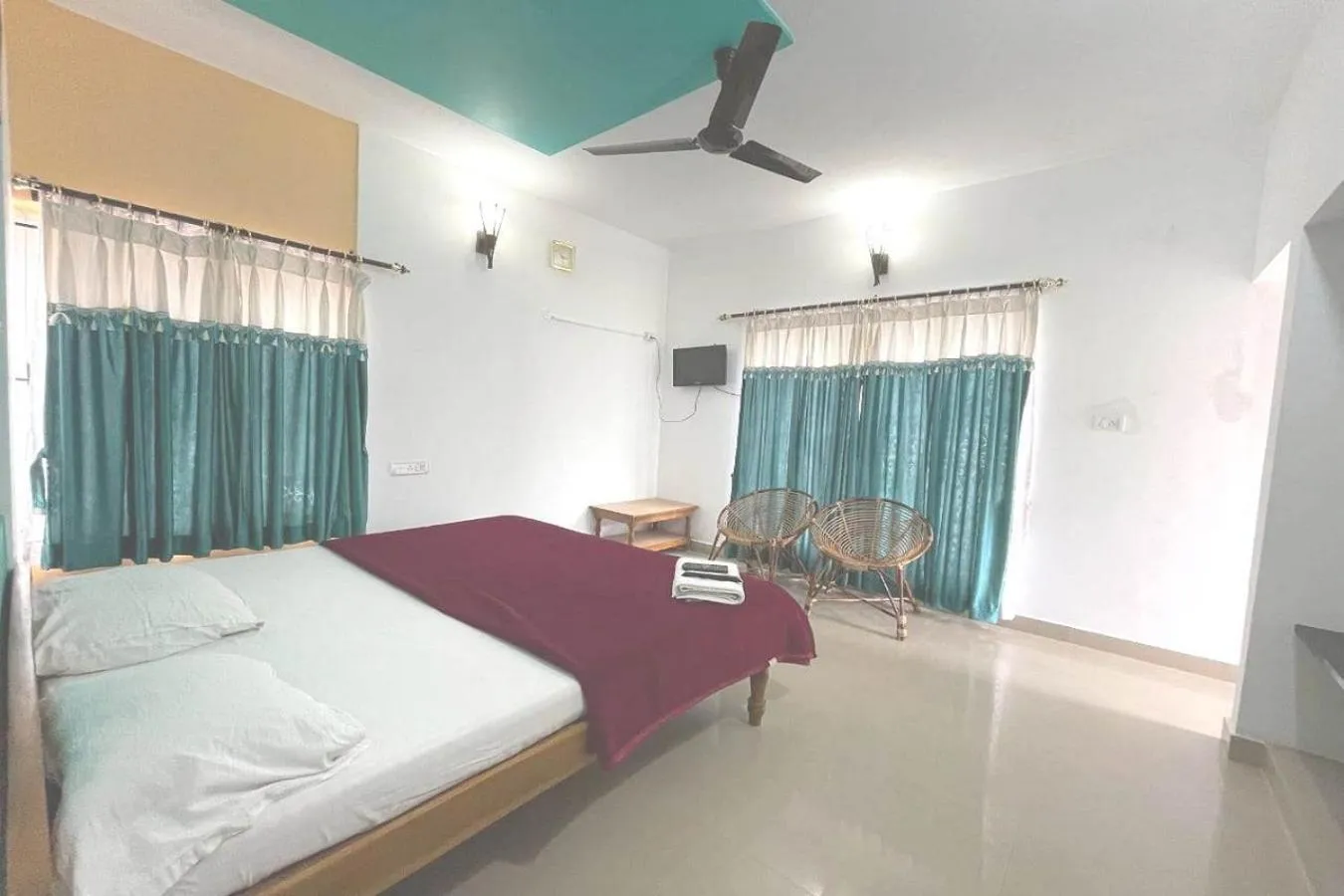 Bed in KBS Sree Paradise Kodai