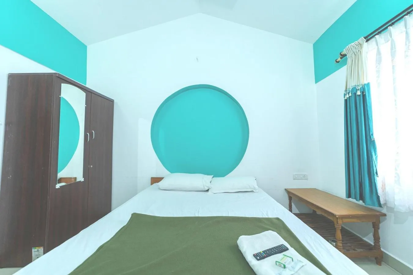 Bed in KBS Sree Paradise Kodai