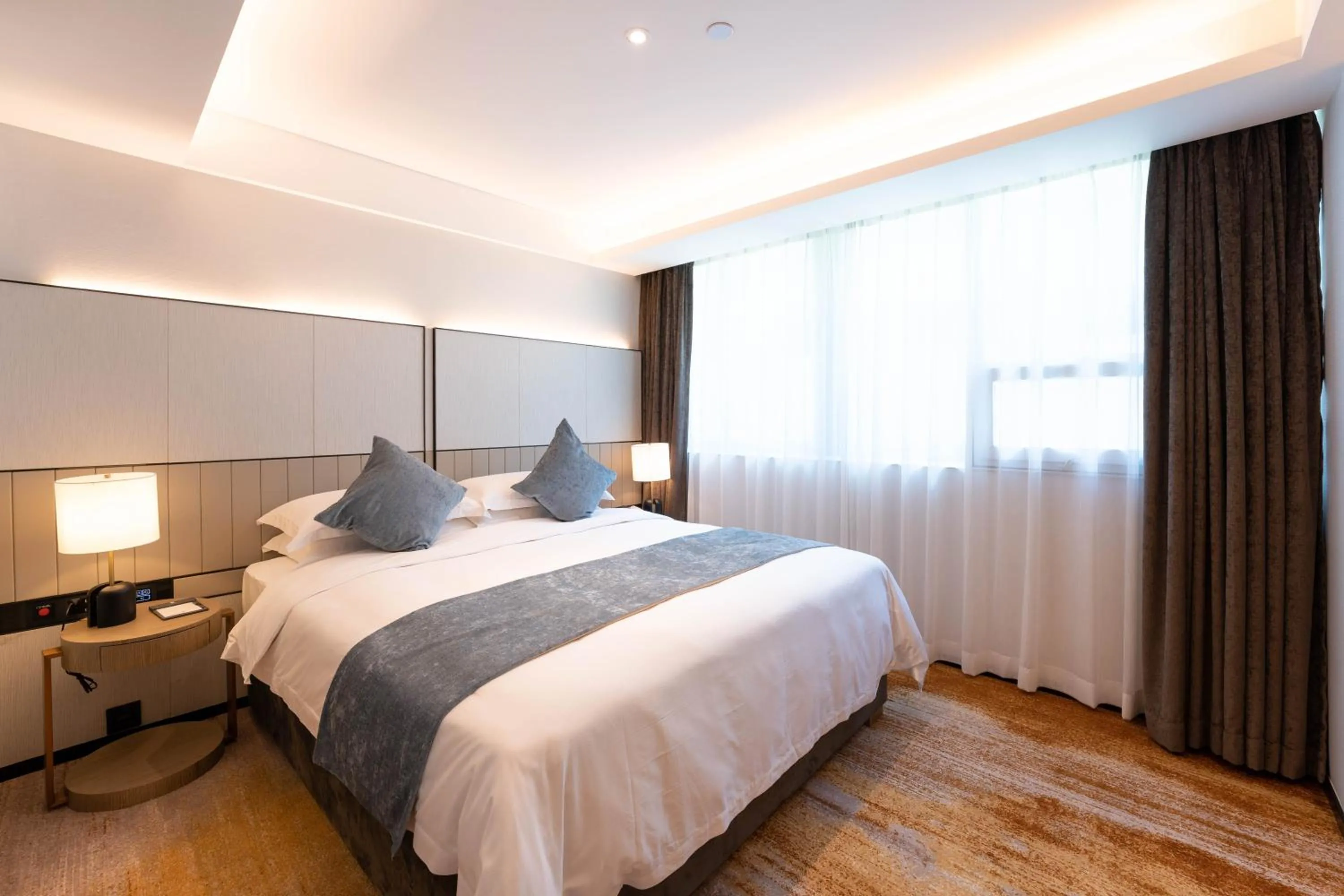 Bed in Zhong Tai Lai Hotel Shenzhen