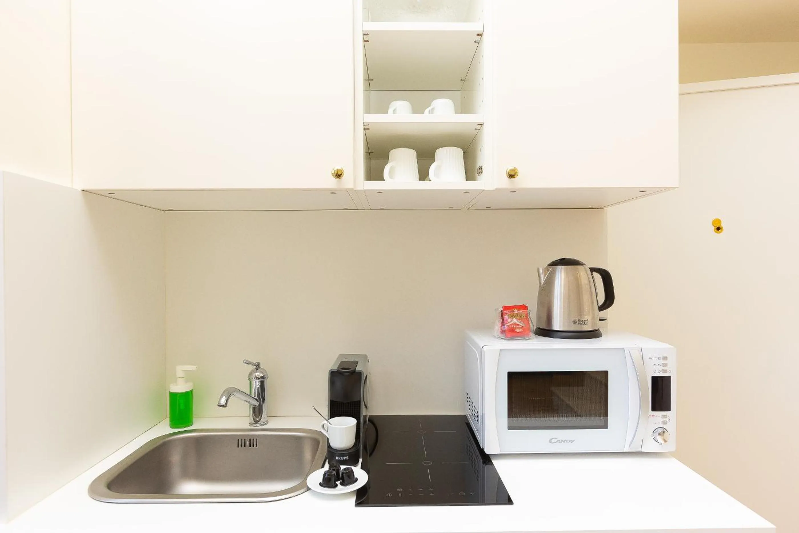 Kitchen or kitchenette in Amazing Piazza Venezia Suites