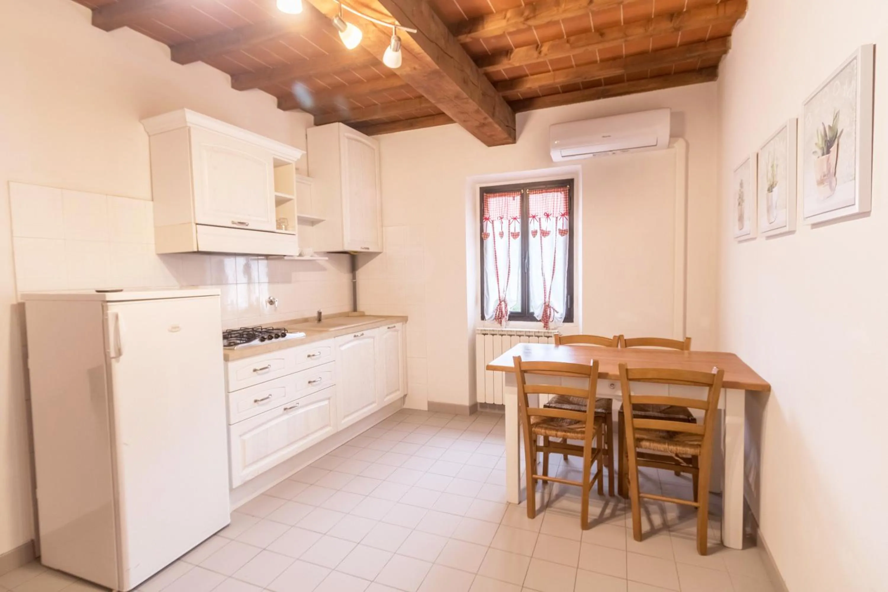Kitchen or kitchenette in Residence Mugello Resort