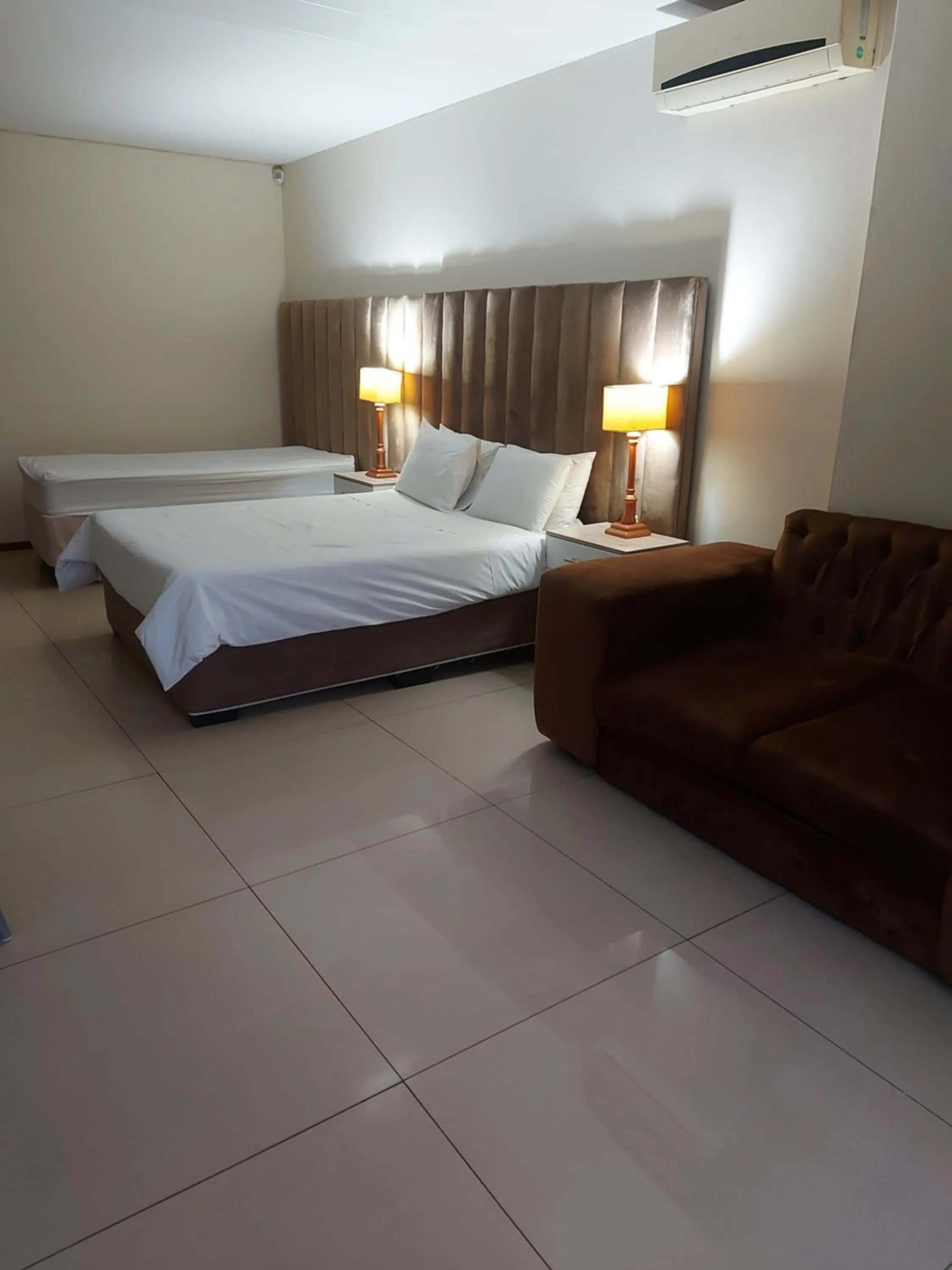 Bed in Purple Olive Guest House