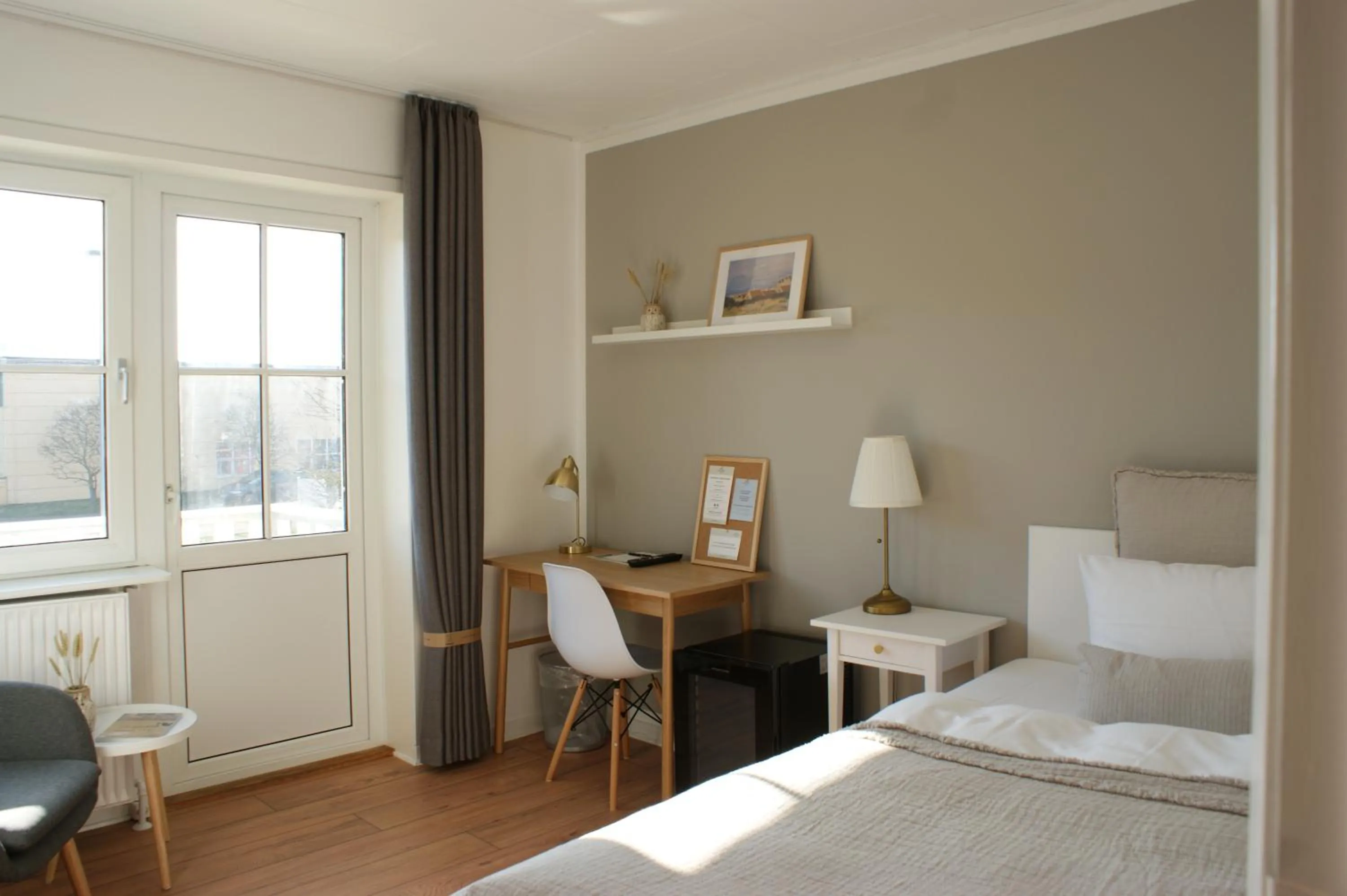 Photo of the whole room, Bed in Hotel Strandly Skagen