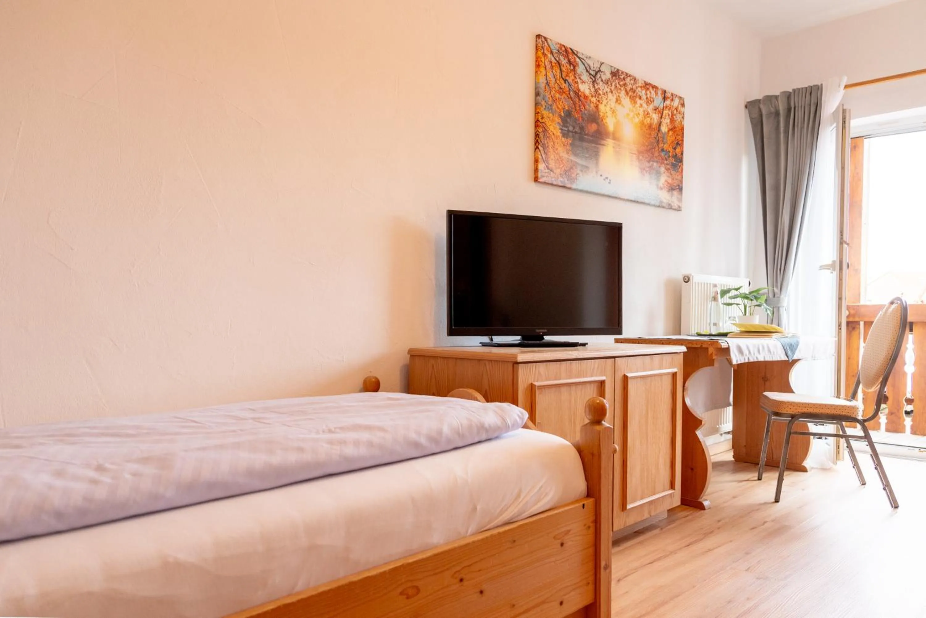 Communal lounge/ TV room, Bed in Grüner Baum