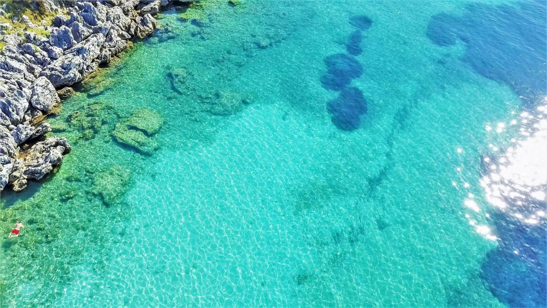 Beach in Corfu Aquamarine Hotel
